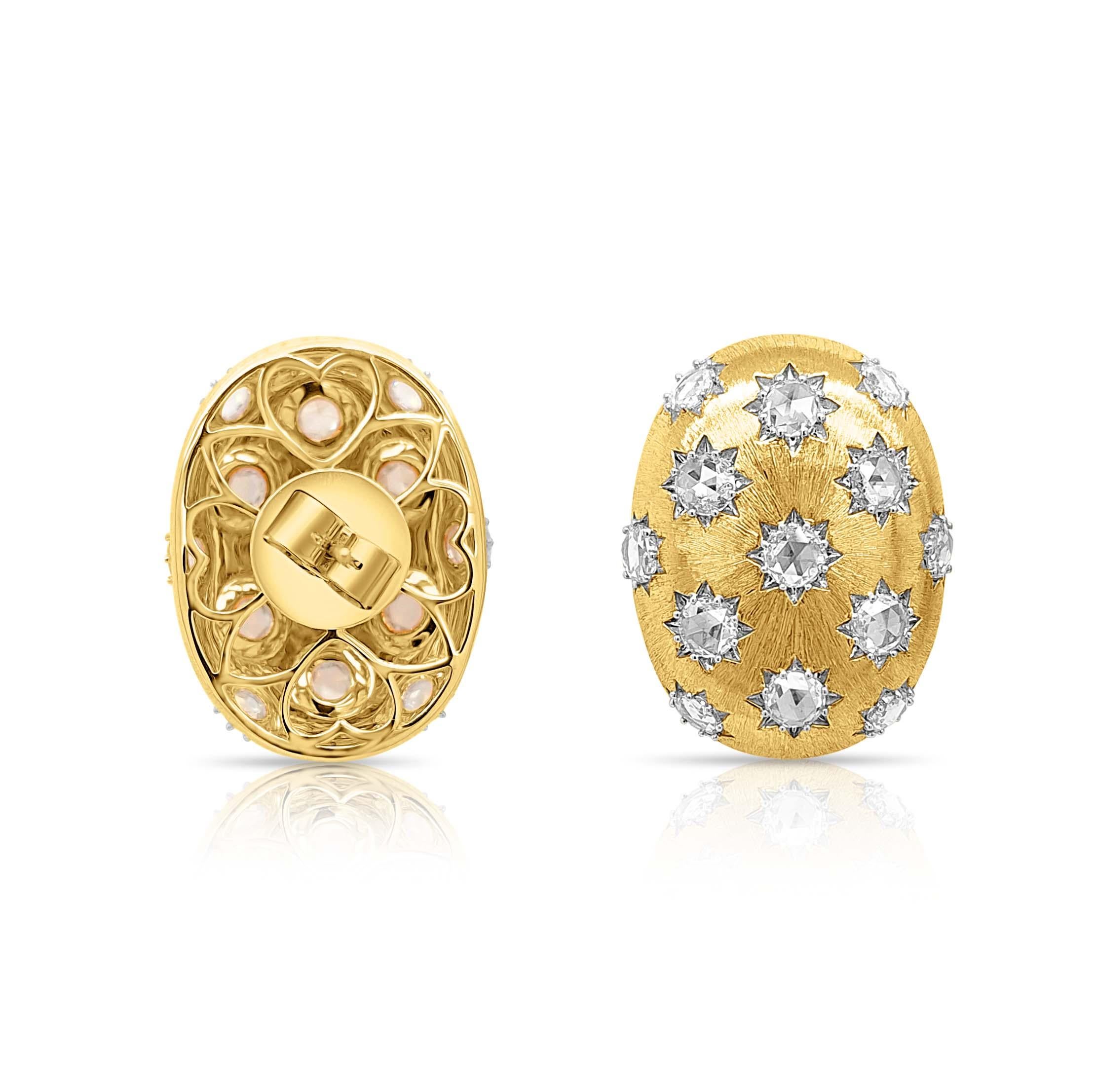 A modernist pair of dome-shaped earrings, crafted in lustrous yellow gold and adorned with enchanting rose-cut white diamonds. Their celestial, star-like sparkle adds a touch of sophistication, making them the perfect statement piece for evening
