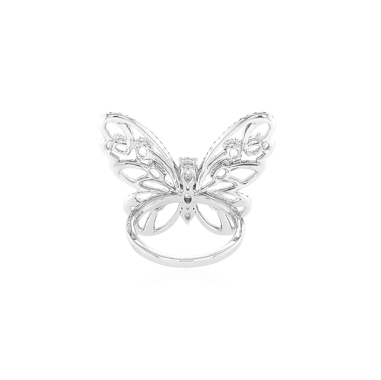 This mesmeric K18 White Gold cocktail ring features exceptional natural Rose-Cut White Diamonds at its forefront. The incredibly Rose Cut diamonds are perfectly accentuated by the diamond butterfly motif which surrounds them. Bold, yet intricate,
