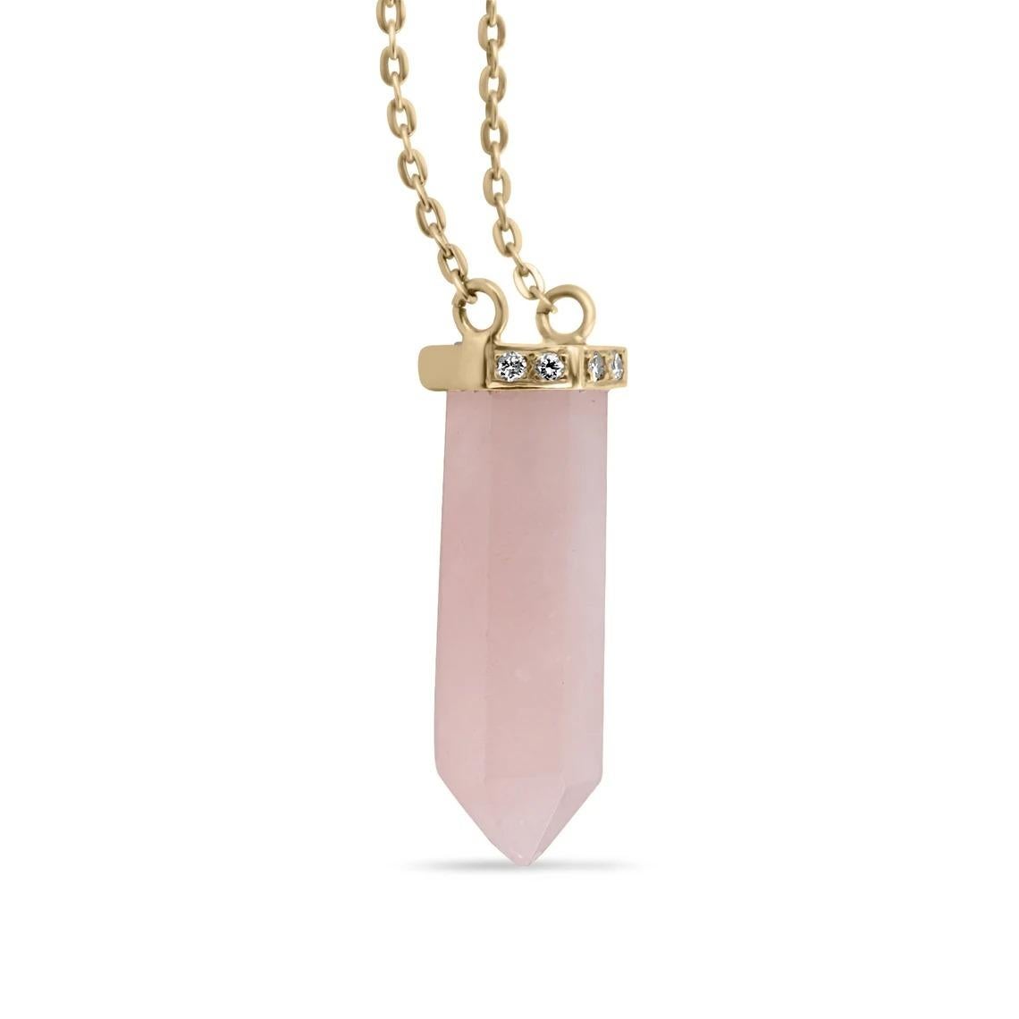 A stunning, natural rose quartz and diamond accent pendant. Known as the stone of 