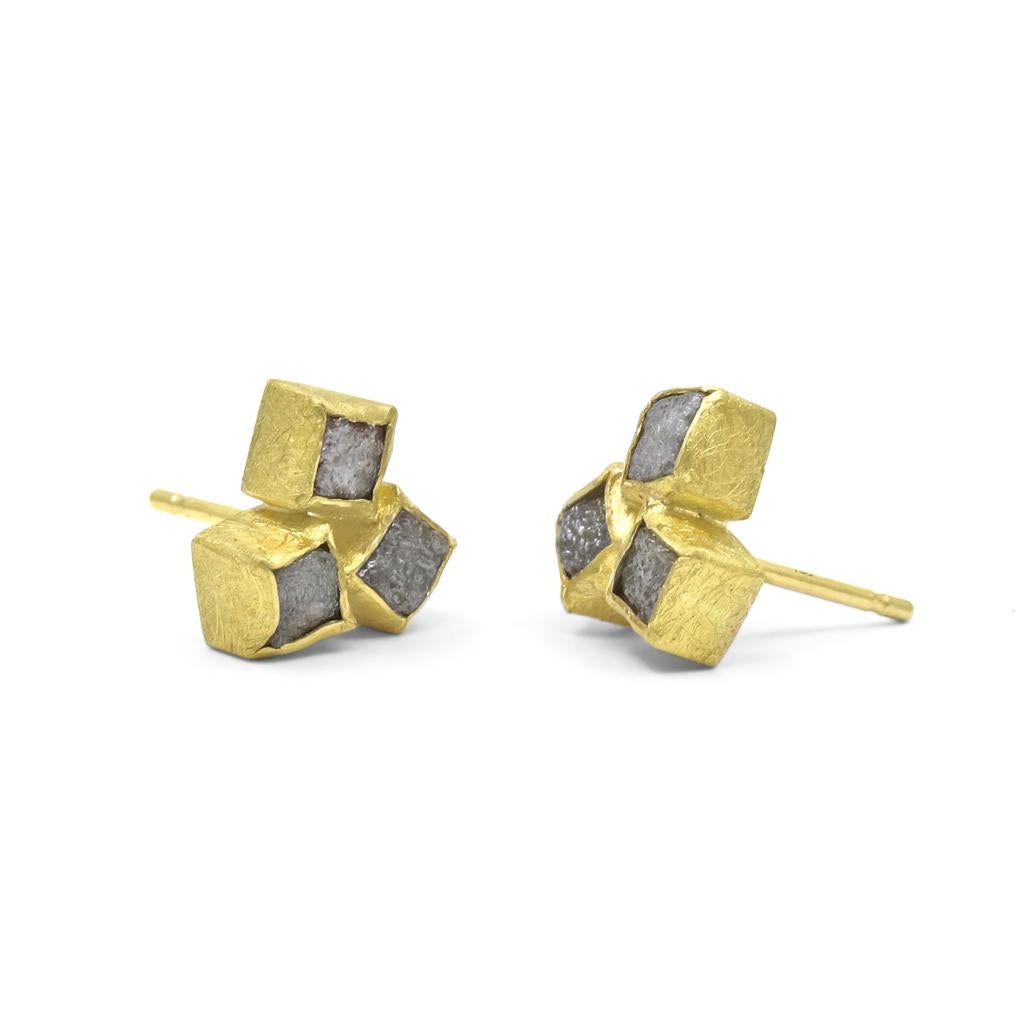 Triple Stone Stud Earrings hand-fabricated by acclaimed jewelry maker Petra Class in her signature-finished 22k yellow gold six matched natural rough diamonds individually bezel-set and finished with 18k gold posts and backs. Each earring stamped