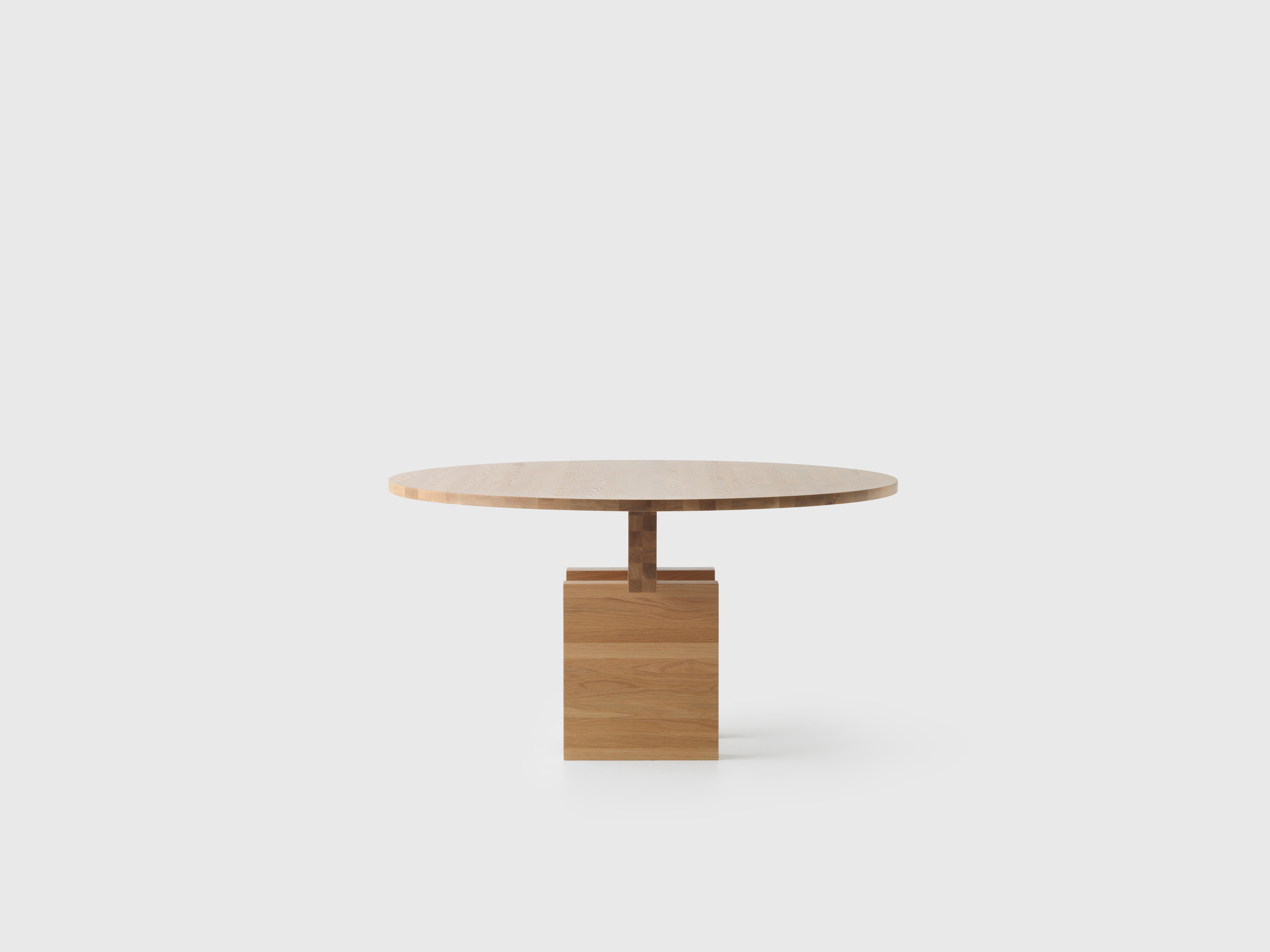 Natural Round 1600 Plane Dining Table by Resident
Dimensions: W 160 x D 94 x H 75 cm
Materials: Solid Oak.
Weight: 94 Kg.

About: 
Founded by Simon James & Scott Bridgens in 2011, Resident is the home of enduring design pieces created for the next