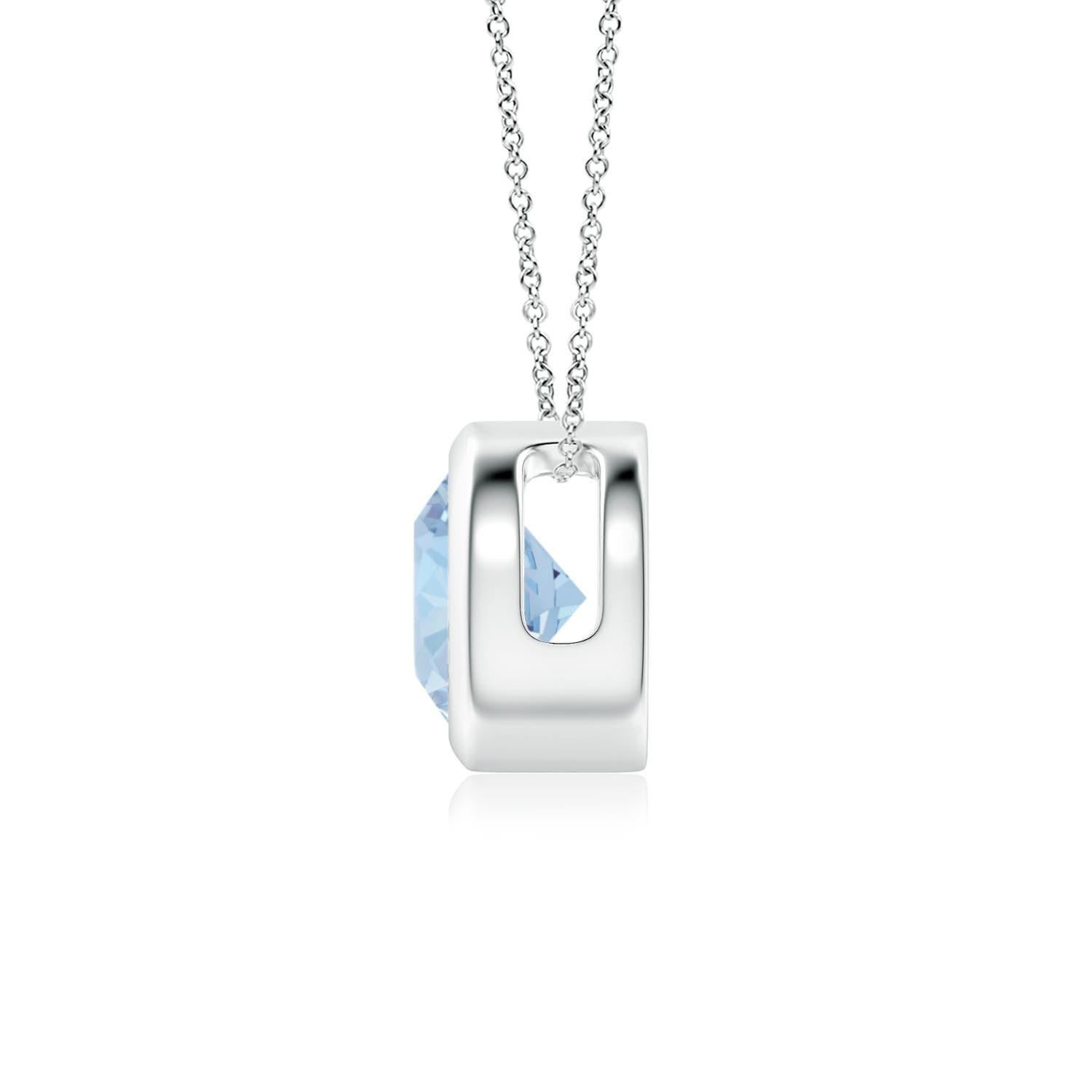 This classic solitaire aquamarine pendant's beautiful design makes the center stone appear like it's floating on the chain. The radiant sea blue aquamarine is secured in a bezel setting. Crafted in platinum, this round aquamarine pendant is simple