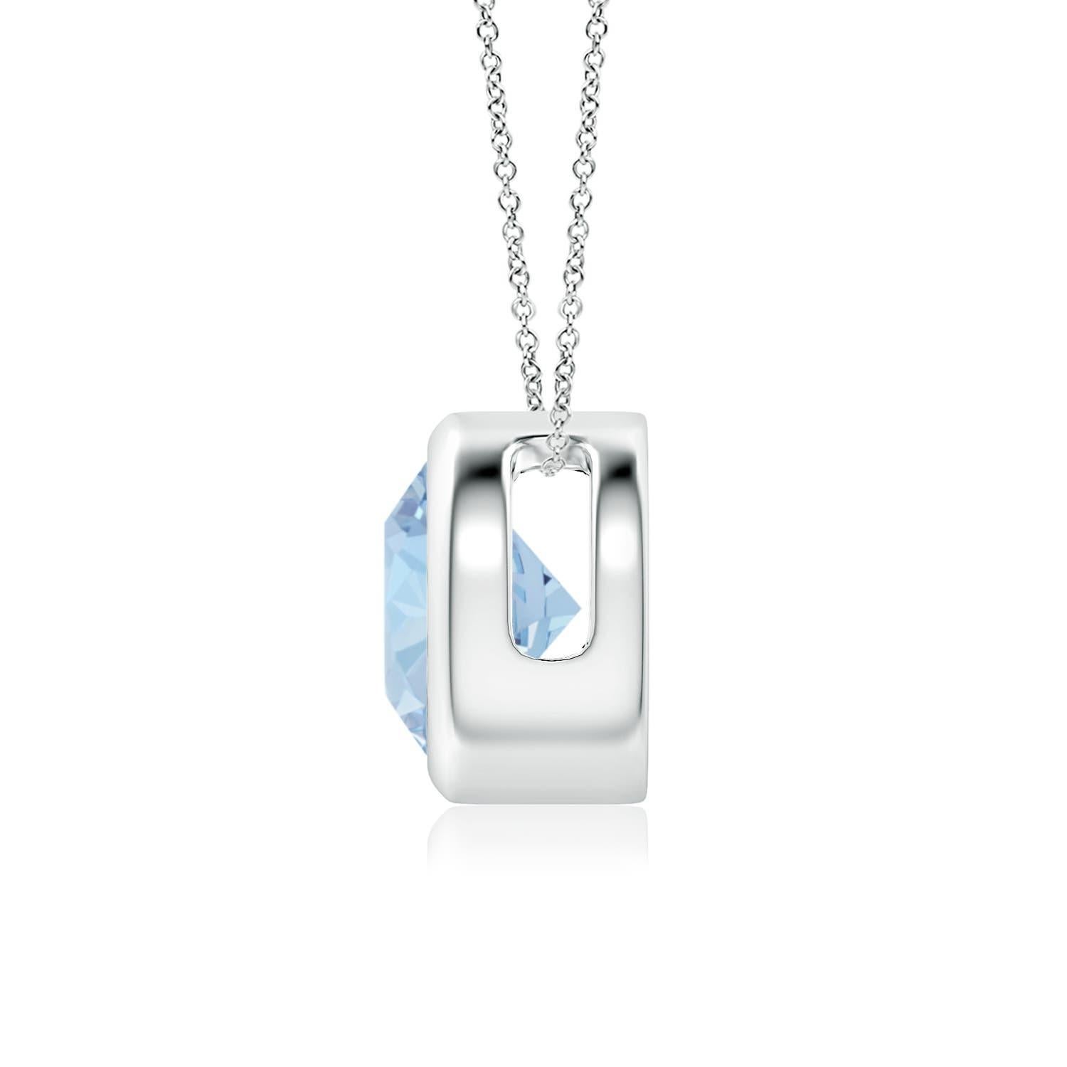 This classic solitaire aquamarine pendant's beautiful design makes the center stone appear like it's floating on the chain. The radiant sea blue aquamarine is secured in a bezel setting. Crafted in platinum, this round aquamarine pendant is simple