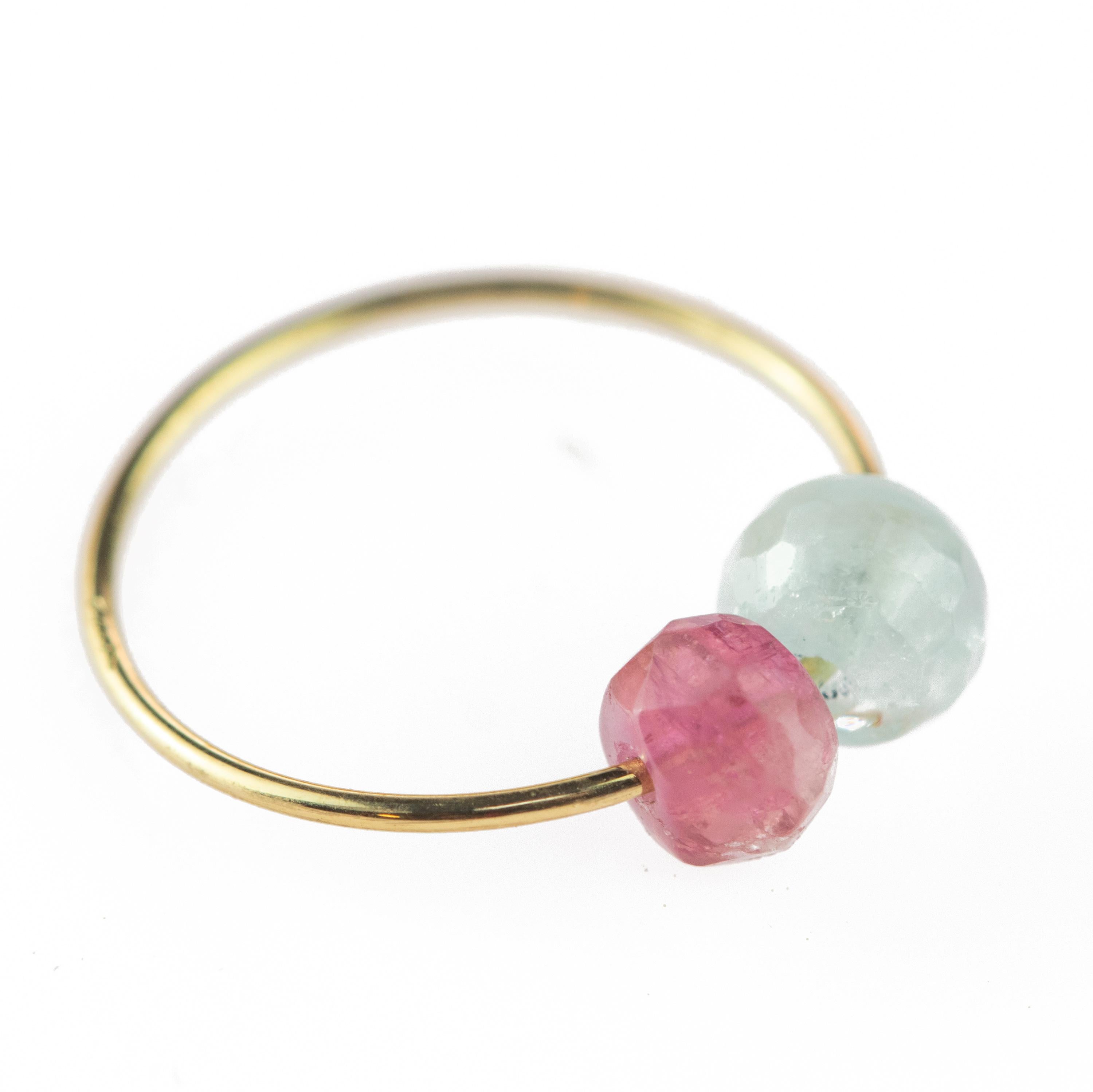 Signature INTINI Jewels Asteroid Planet ring. Contemporary ring design in 18 karat yellow gold with a precious aquamarine and tourmaline beads. Passion and intensity mixed in one jewel. Delight yourself with a strong, minimalist design, just for a