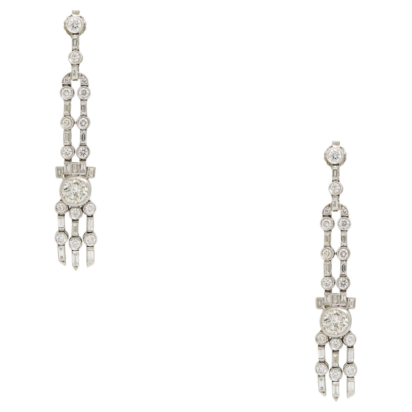 Natural Round Brilliant Diamond Drop Vintage Platinum Earrings In Stock For Sale