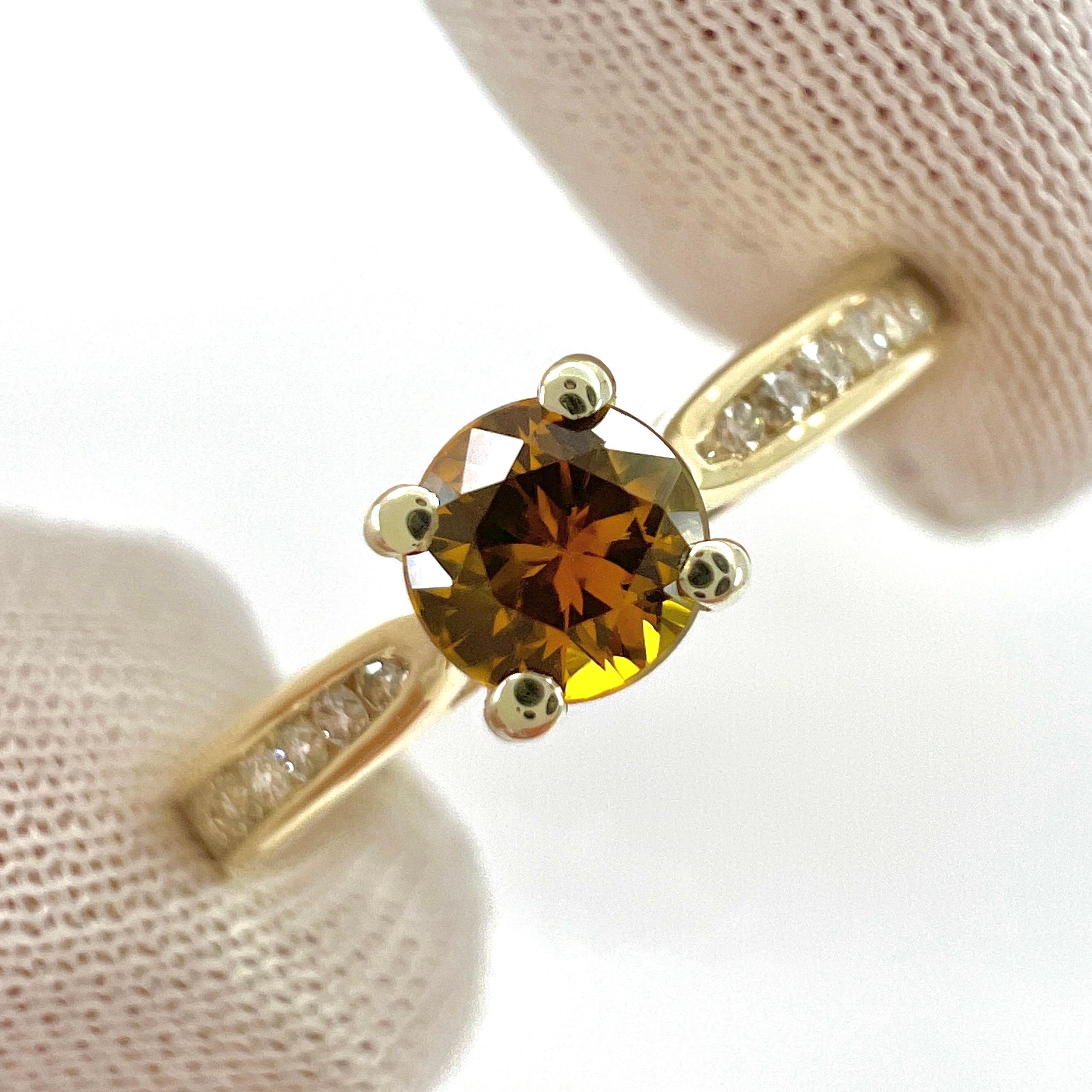 Natural Round Cut Orange Sapphire And Diamond White And Yellow Gold Ring.

0.51 Carat total. This ring features a beautiful orange sapphire stone with a deep orange colour and excellent cut and clarity. The sapphire measures 4mm (0.40 carat).

The