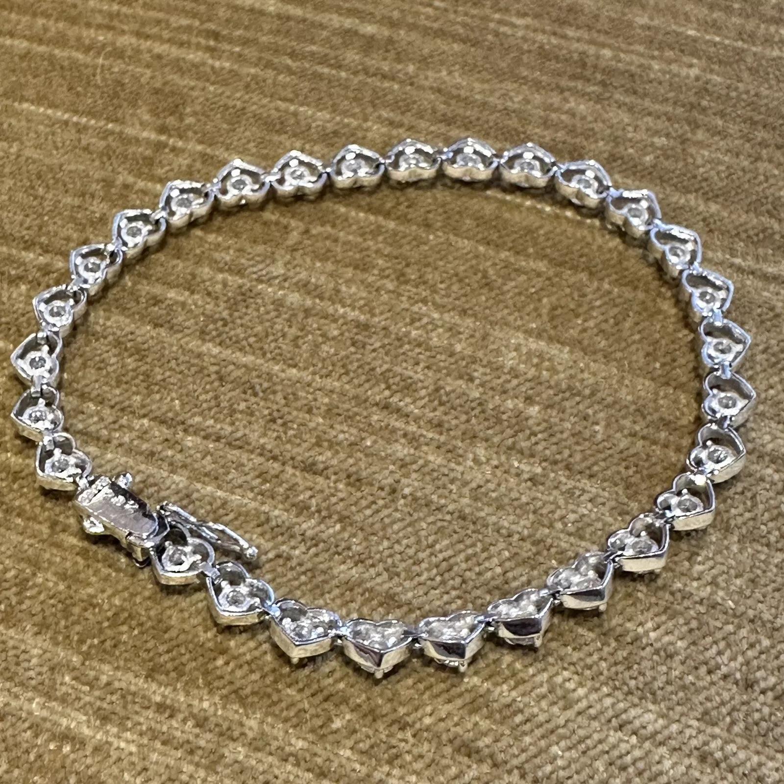 Natural Round Diamond Bracelet with Heart Shaped Platinum Setting 1