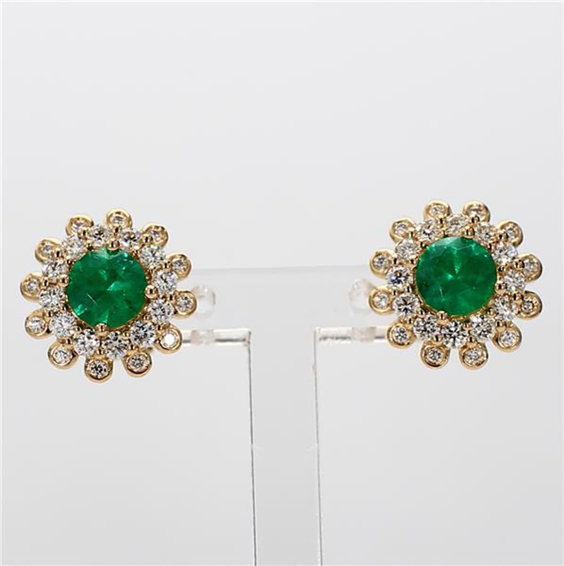 RareGemWorld's classic emerald earrings. Mounted in a beautiful 14K Yellow Gold setting with natural round cut green emerald's. The emerald's are surrounded by natural round white diamond melee. These earrings are guaranteed to impress and enhance