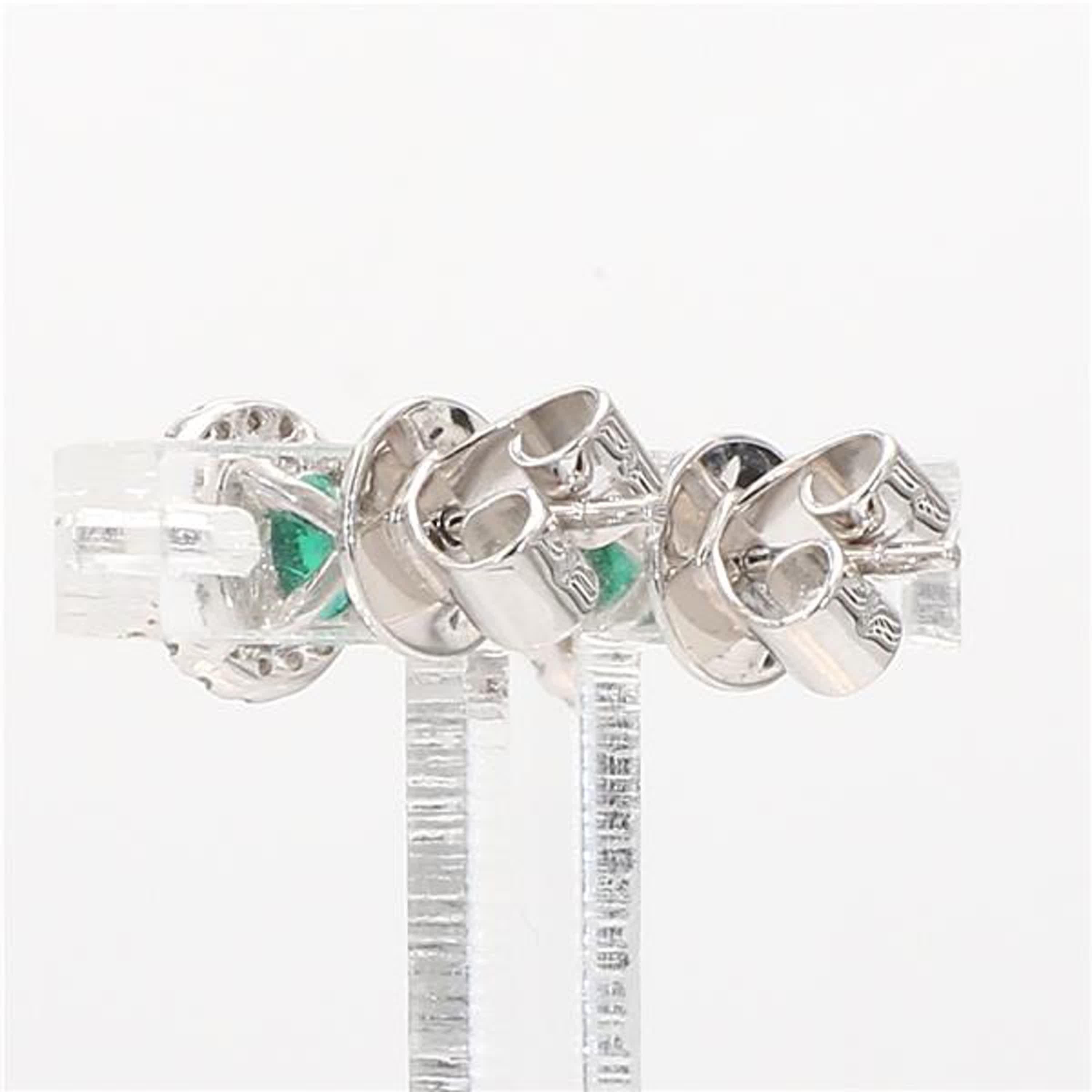 Round Cut Natural Round Emerald and White Diamond .86 Carat TW White Gold Stud Earrings For Sale