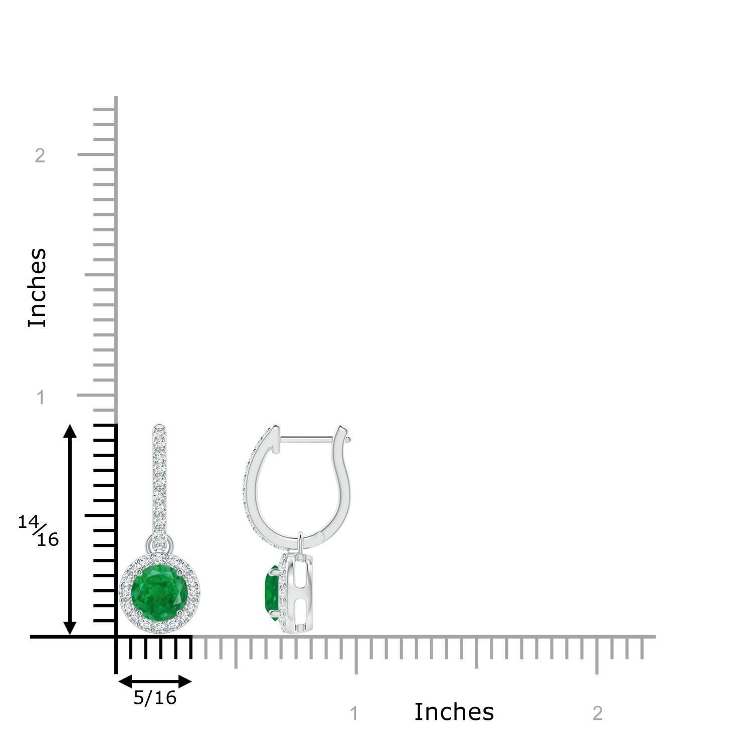 Nestled within a glimmering halo of round diamonds are round lush green emeralds in prong settings. The diamond accents on the hoop lend an additional touch of elegance to these emerald dangle earrings crafted in 14k white gold.
Emerald is the