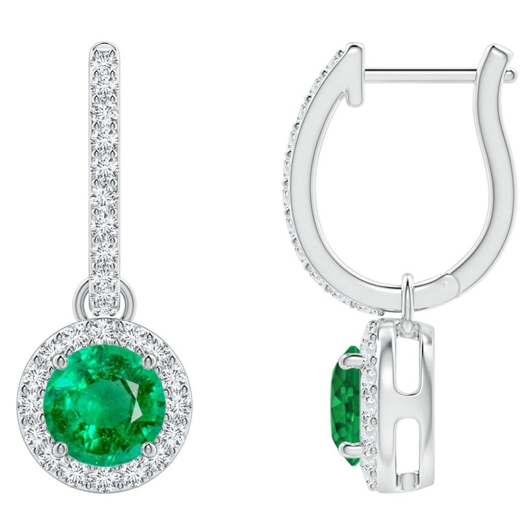 Orecchini con smeraldo rotondo Nature e diamante aureolato in platino (misura 5 mm)