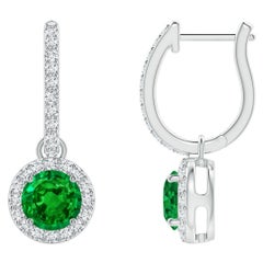 Orecchini con smeraldo rotondo Nature e diamante aureolato in platino (misura 5 mm)
