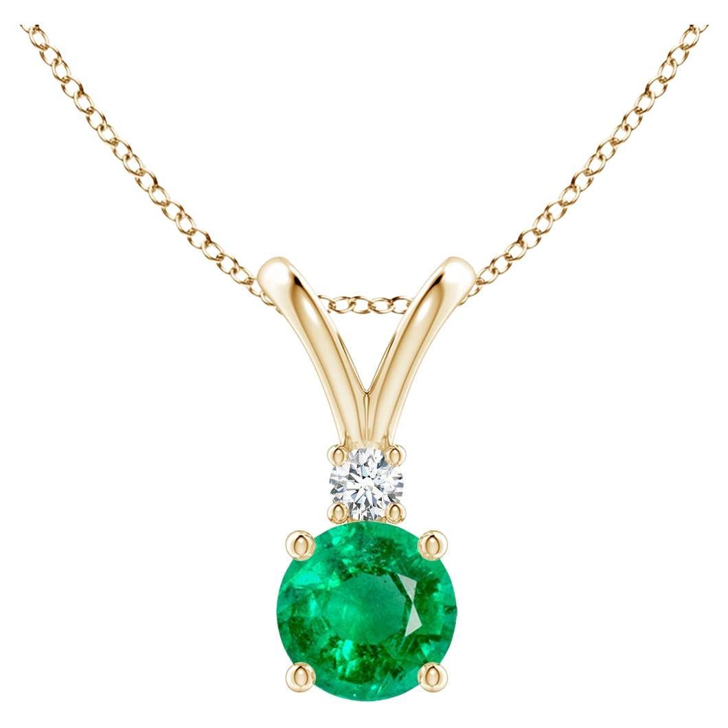 Natural Round 0.45ct Emerald Solitaire Pendant with Diamond in 14K Yellow Gold For Sale