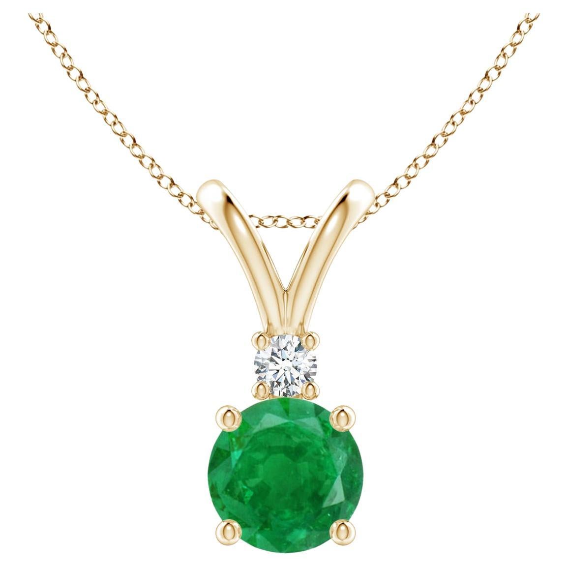 Natural Round 0.75ct Emerald Solitaire Pendant with Diamond in 14K Yellow Gold For Sale