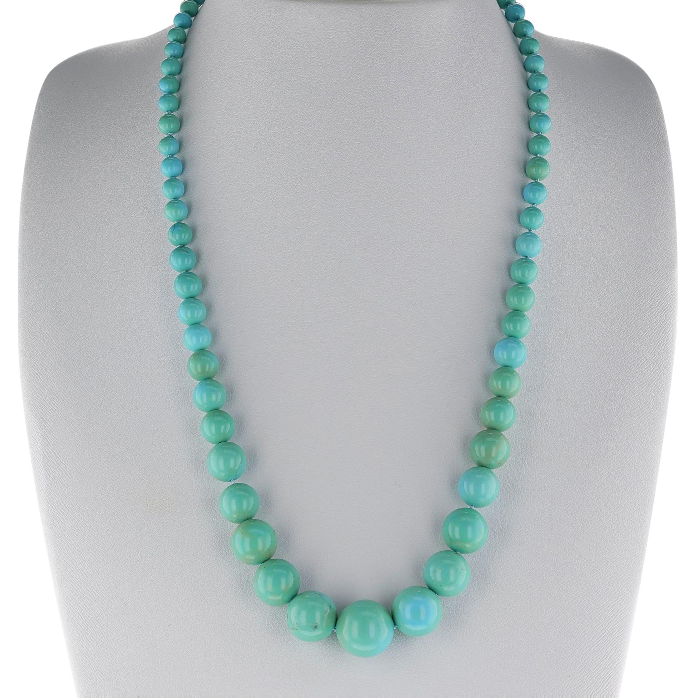 A natural turquoise necklace with round, smooth, and graduating-in-size beads from 3.75MM to 13MM. The clasp is 14K Yellow Gold. The length of the necklace is 18 inches. The total weight of the necklace is 26.77 grams. 