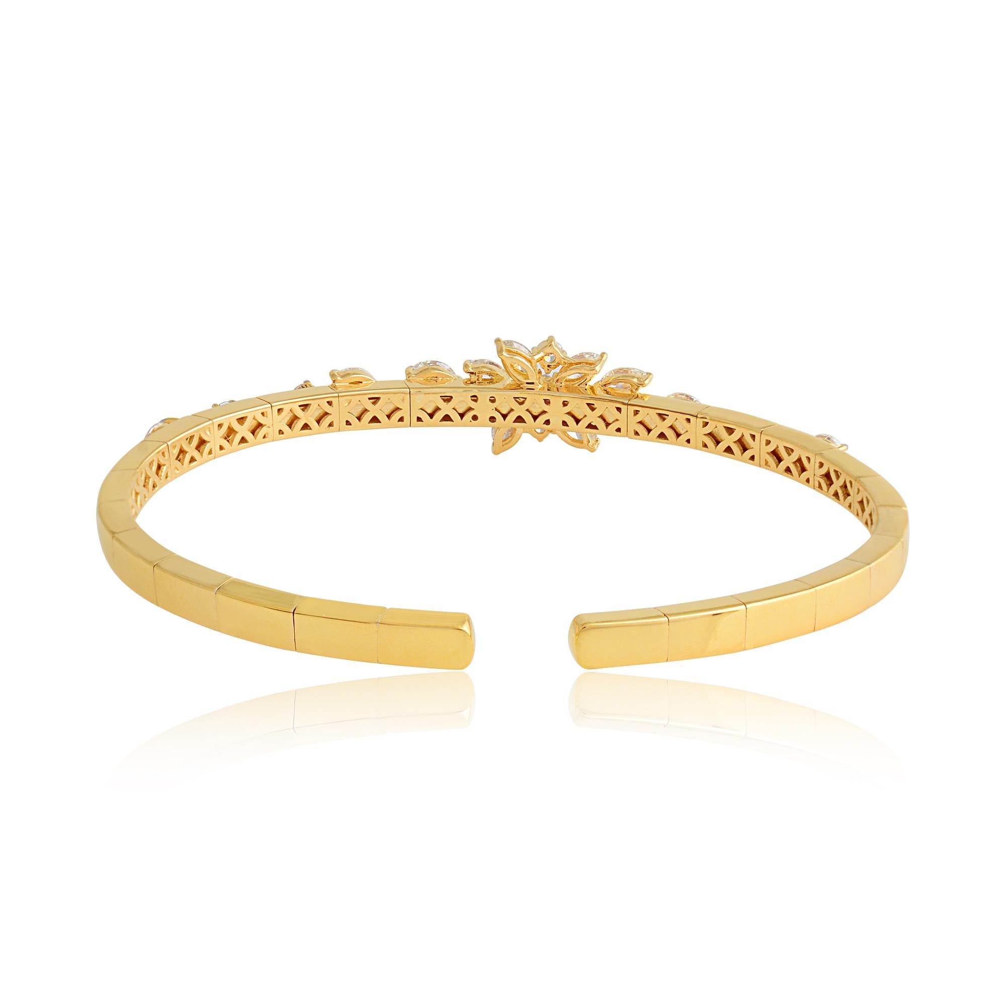 Crafted by skilled artisans, this bracelet is a true work of art, meticulously handcrafted to perfection. The 18 karat yellow gold setting provides the perfect backdrop for the dazzling diamonds, enhancing their brilliance and radiance with its warm