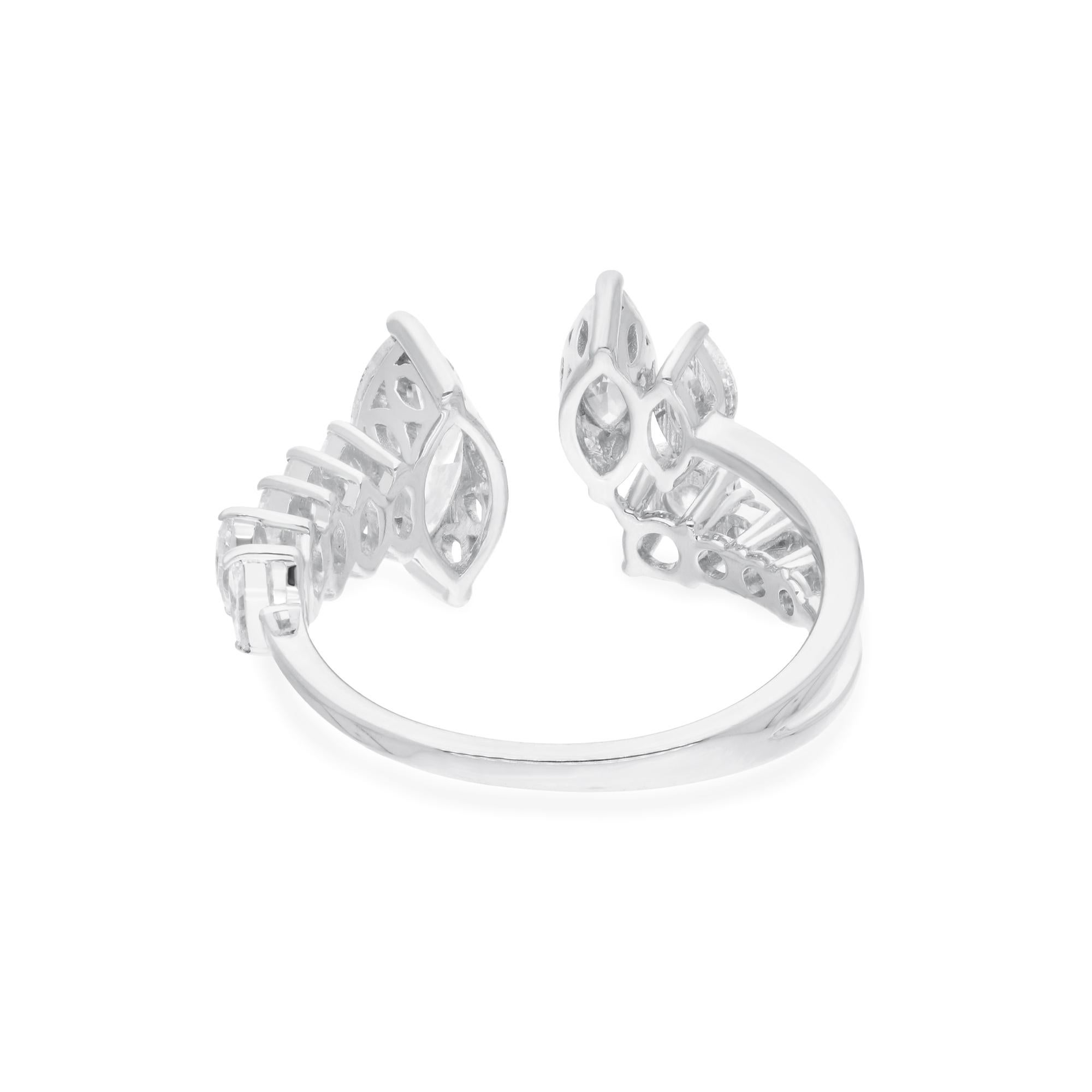 Crafted with meticulous attention to detail, the diamonds are set in a cuff design that elegantly wraps around your finger, creating a sense of movement and fluidity. The lustrous 14 Karat White Gold setting enhances the beauty of the diamonds,