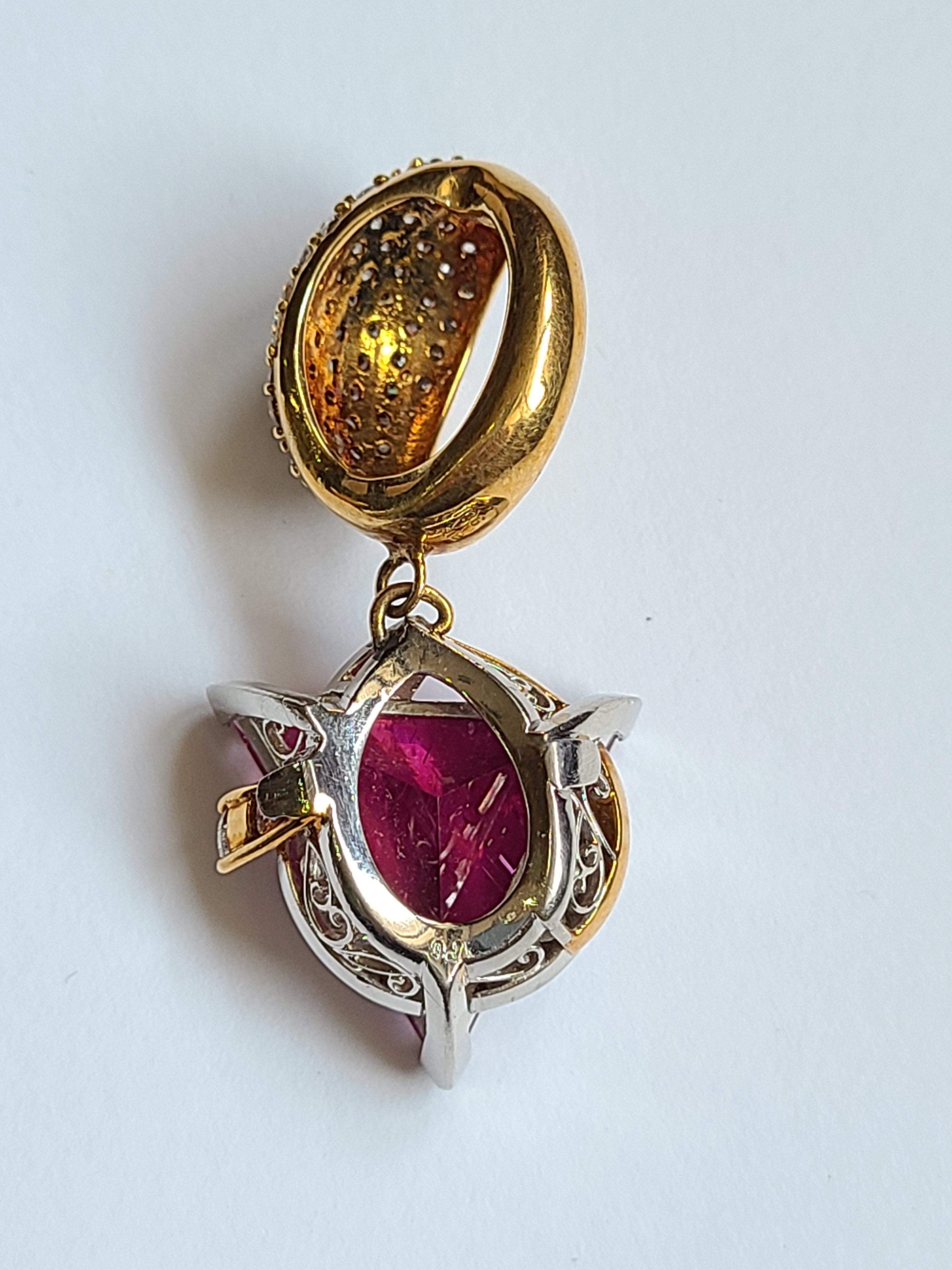 A pretty and modern rubellite pendant set in gold and platinum with diamonds. The Gross weight of the pendant is 16.13 grams and diamond weight is 1.16 carats. The pendant dimensions in cm 4 x 1 x .06 (LXWXH)