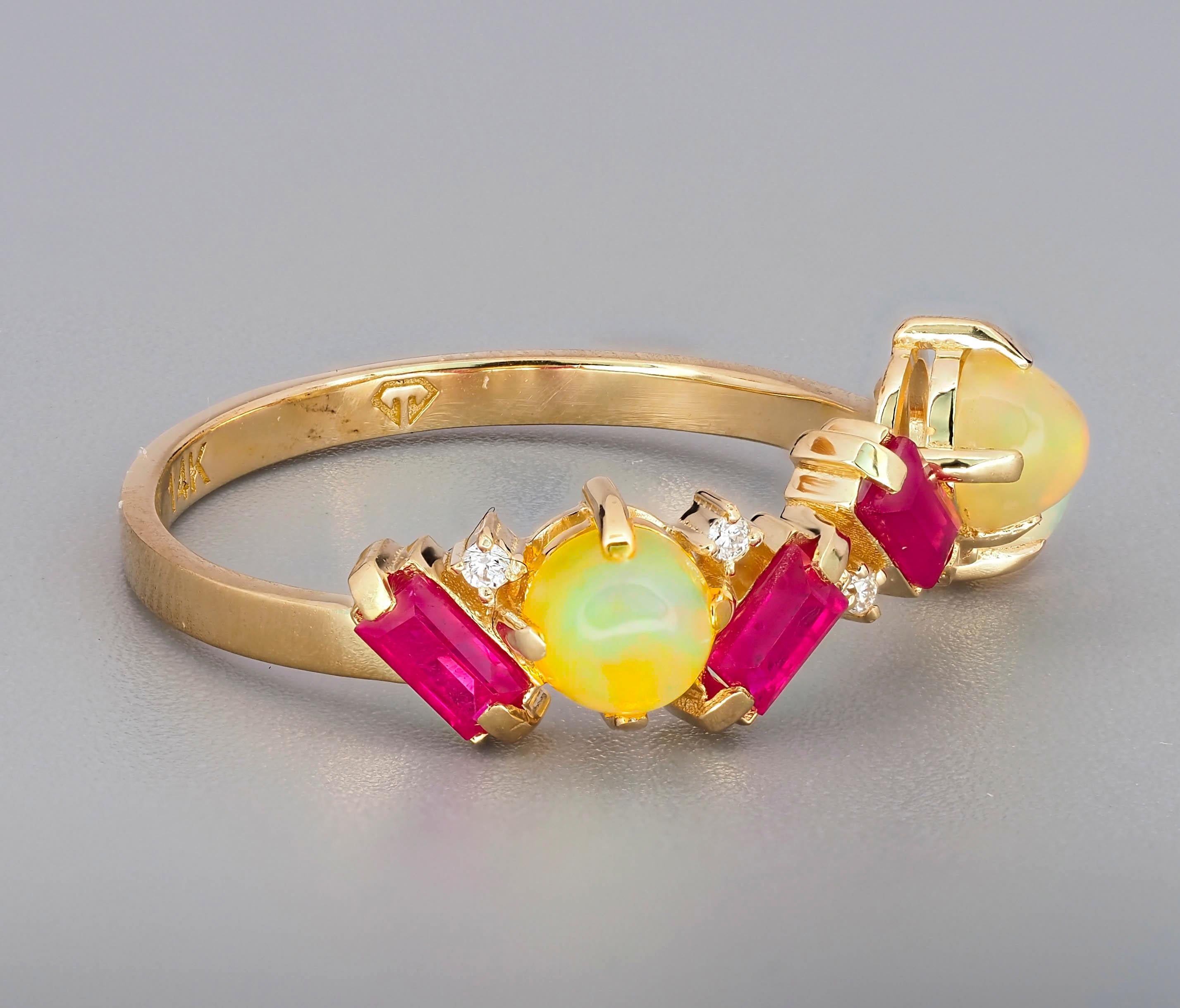 Natural rubies, opals and diamonds ring.

Weight: 1.75 g. depends from size
Metal - 14k gold

Central stone: rubies 3 pieces
Cut: baguettes
Weight: aprx 0.45 ct.
Color: red
Clarity: Transparent with inclusions

Set with opals - 3 piecs - Cut: round
