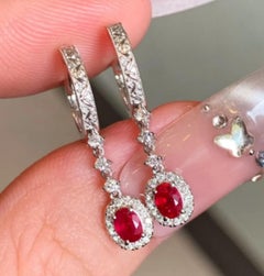 Natürlicher Rubin 0,50cts & Diamant 0,24cts Ohrring in 14k Gold