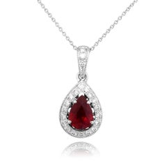 Pendentif en or blanc 18 carats serti d'un rubis naturel de 0,86 carat et de diamants totalisant 0,16 carat