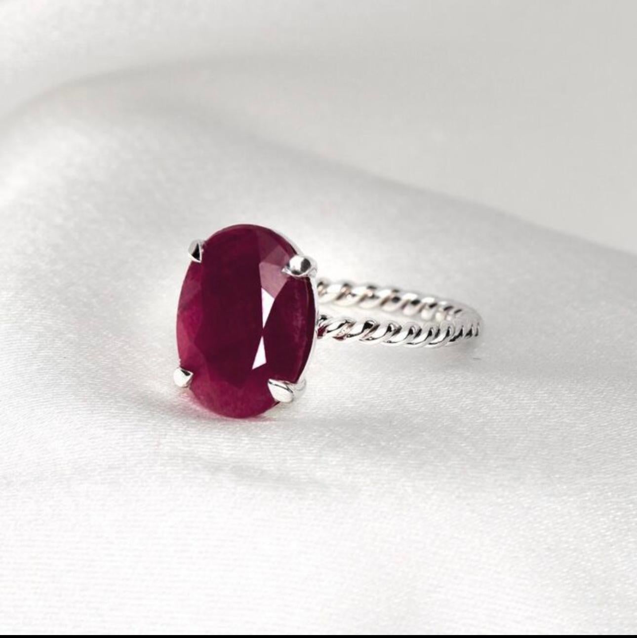 Beautiful 14 K white gold ring, which represents a natural not heated and not treated  certified natural ruby. The weight of the gem is 5.97 Carats. The dimension of this mixed cut oval ruby is 12.65 mm x 9.42 mm x 5.47mm. 

The elegance and