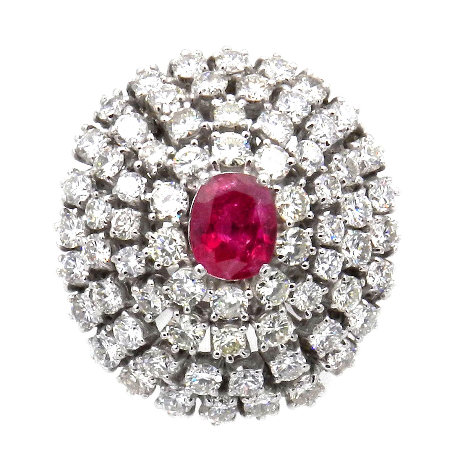 Natural Ruby and 4 Carat Diamond Cocktail Ring in 18K White Gold

This impressive estate cocktail ring is crafted in 18K white gold, the opulent domed ring head is set with a natural ruby ​​of 1.4 carat and is surrounded by 70 sparkling brilliant