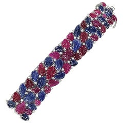 Bracelet non chauffé en or 18 carats avec rubis naturel et saphirs bleus et diamants