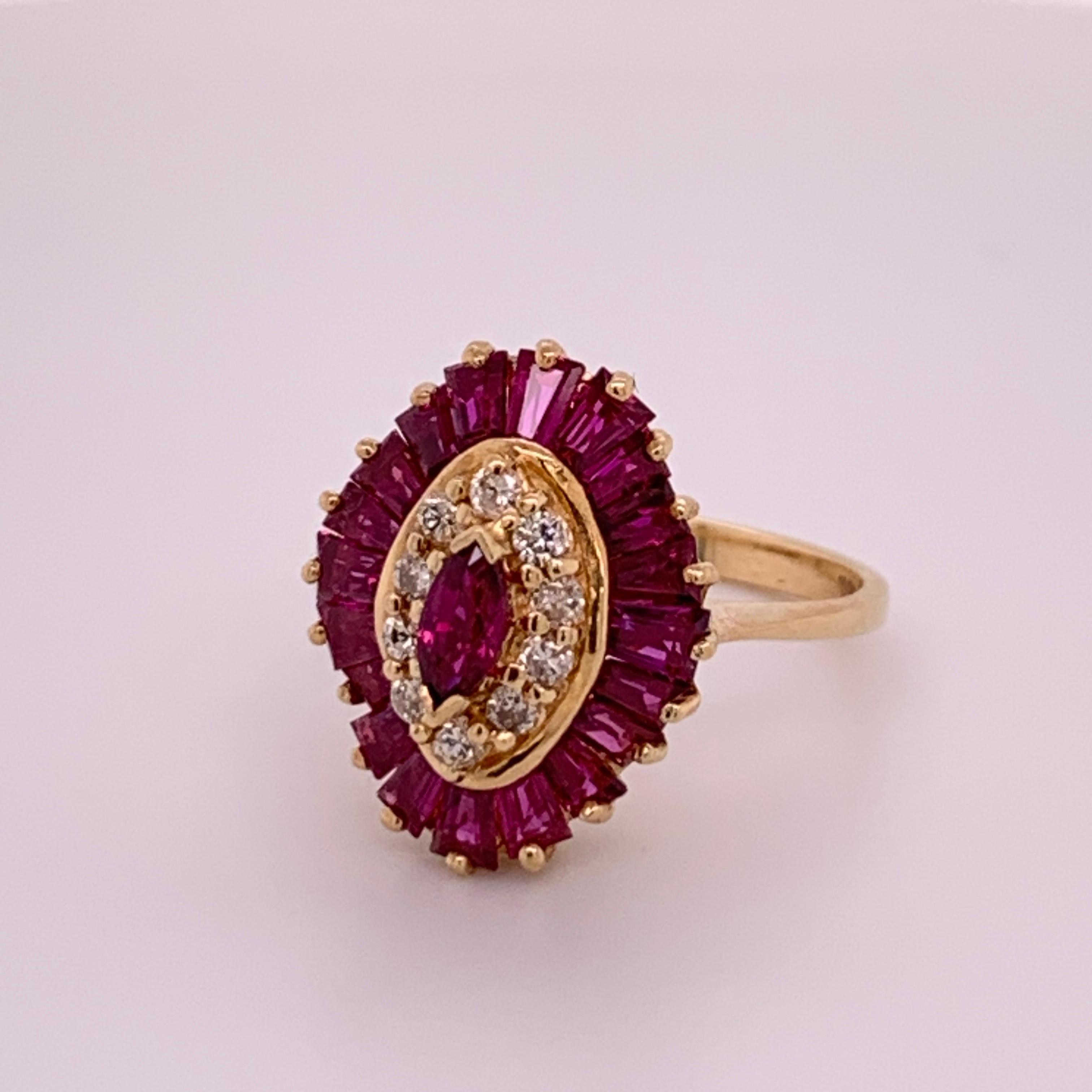 14k yellow gold ballerina ring with a “B” Hallmark. Size 6.25. 

The natural baguette (20) rubies measure 3.2x2.3mm and marquise (1) ruby measures 5.5x2.7mm. The ring is set with 10 round brilliant diamonds. 