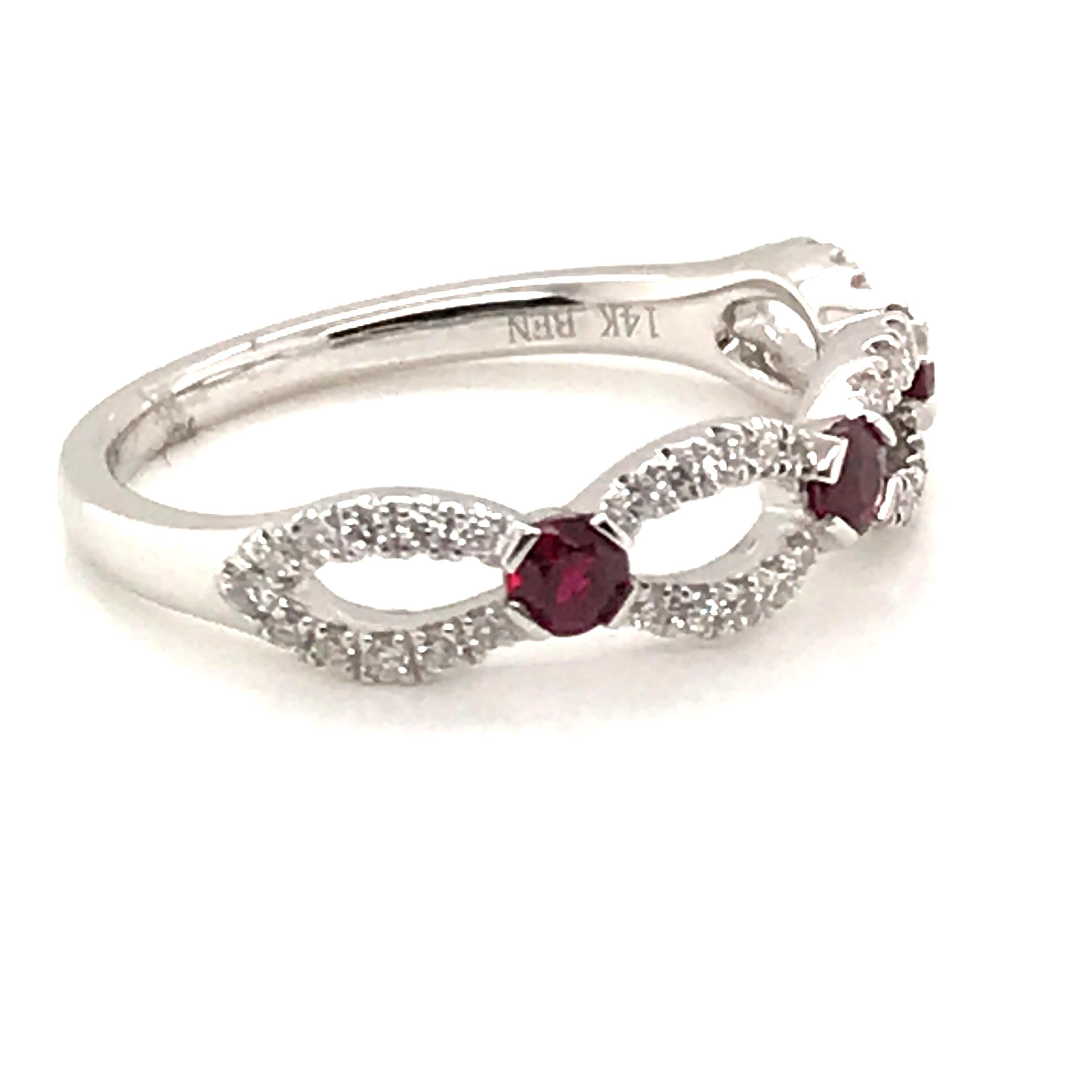 HJN Inc. Ring featuring a Natural Ruby and Diamond Fashion Band

Ruby Weight: 0.37 Carats 
Round-Cut Diamond Weight: 0.21 Carats 

Clarity Grade: SI1 
Color Grade: G
Polish and Symmetry: Very Good
Style Number: JA498RDWG