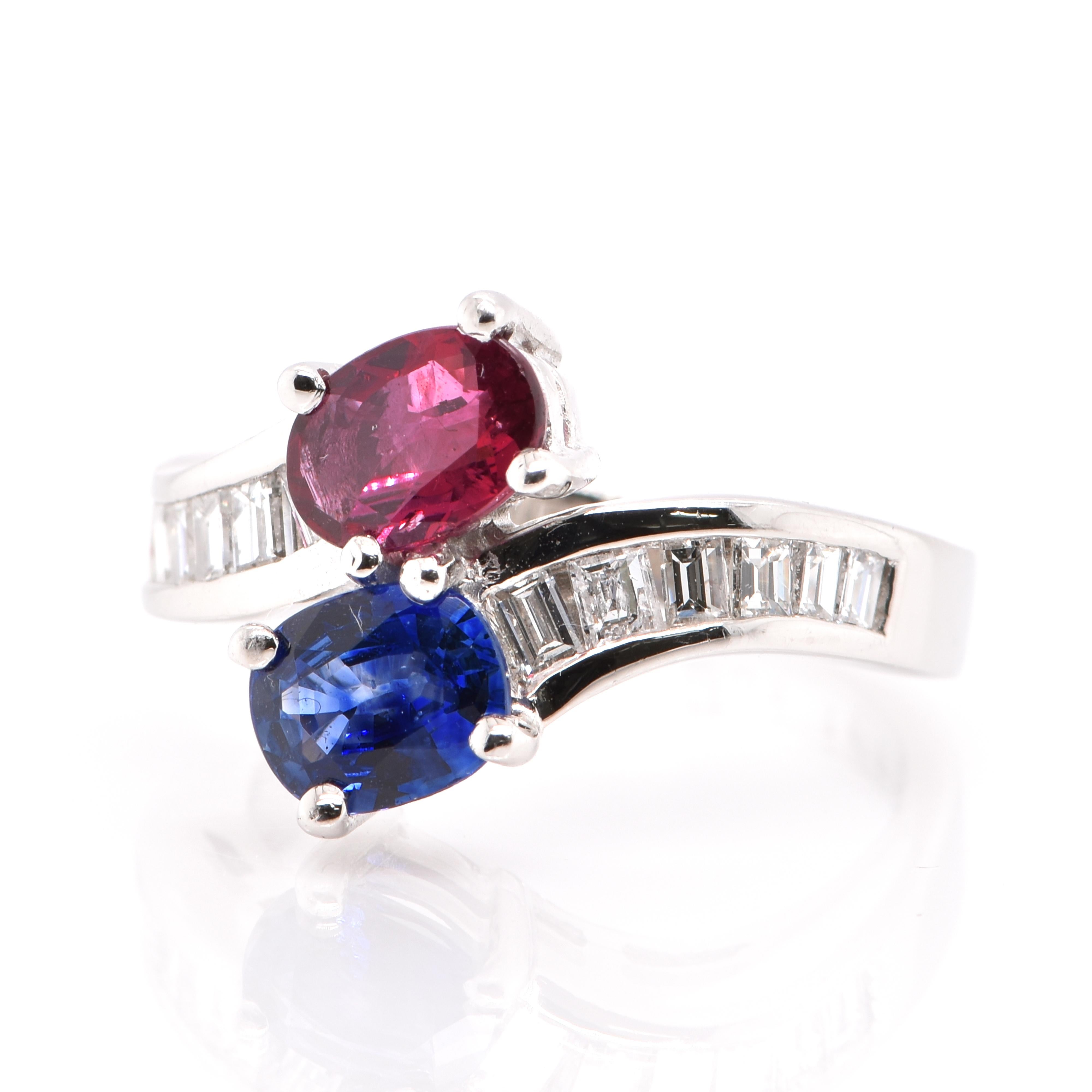 A beautiful Duo Ring featuring a 0.93 Carat, Natural, Ruby, 0.91 Carat Natural, Blue Sapphire and 0.61 Carats of Diamond Accents set in Platinum. Sapphires and Ruby both belong to the Corundum Family of Gems. They have extraordinary durability -