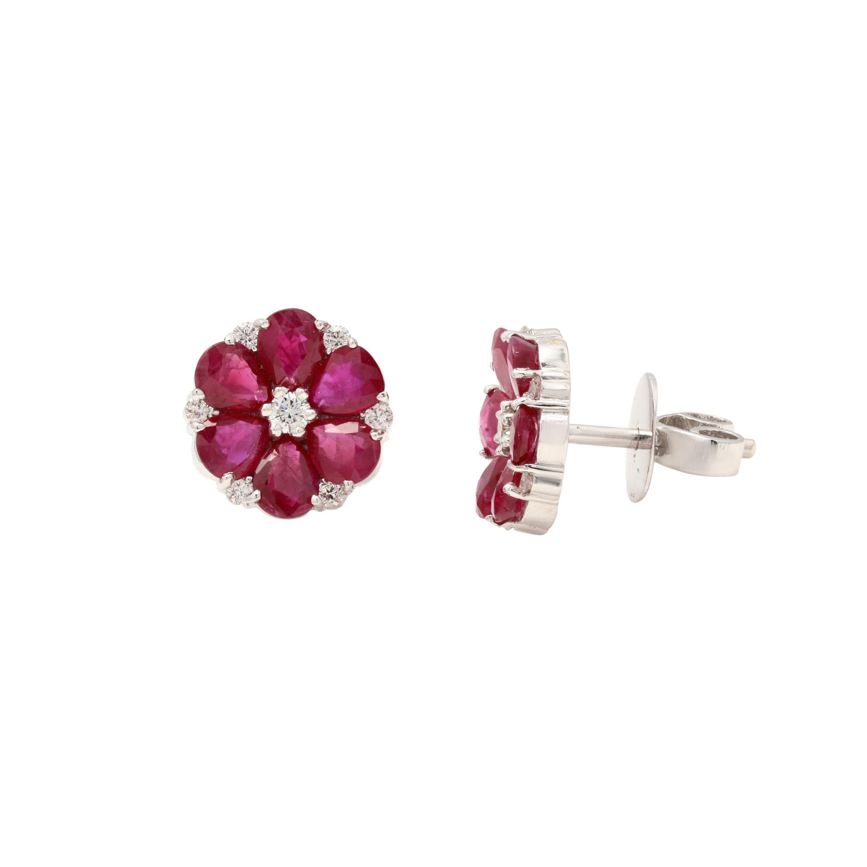 Pear Cut Ruby Flower Studs in 18K Gold with Diamonds. Embrace your look with these stunning pair of earrings suitable for any occasion to complete your outfit.
Studs create a subtle beauty while showcasing the colors of the natural precious