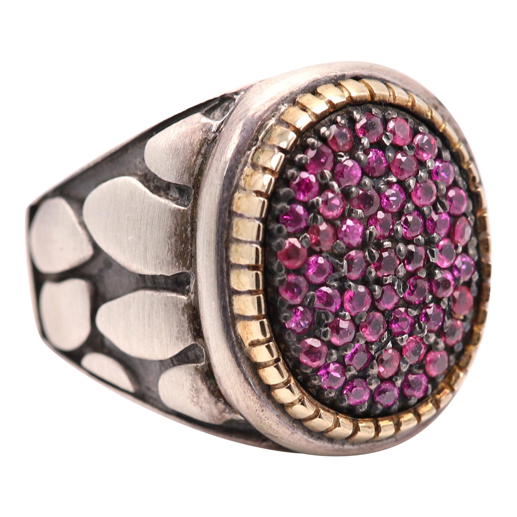 Vintage Brilliant Ring with a Cluster of Natural Ruby Stones
Approx ruby area size 17 x 13 mm
Mostly Sterling Silver 925 and the bezel is Real 18k yellow gold.
Well craftsmanship - made in Italy
Finger size 7 (can be re-sized)
Overall weight is 12.6