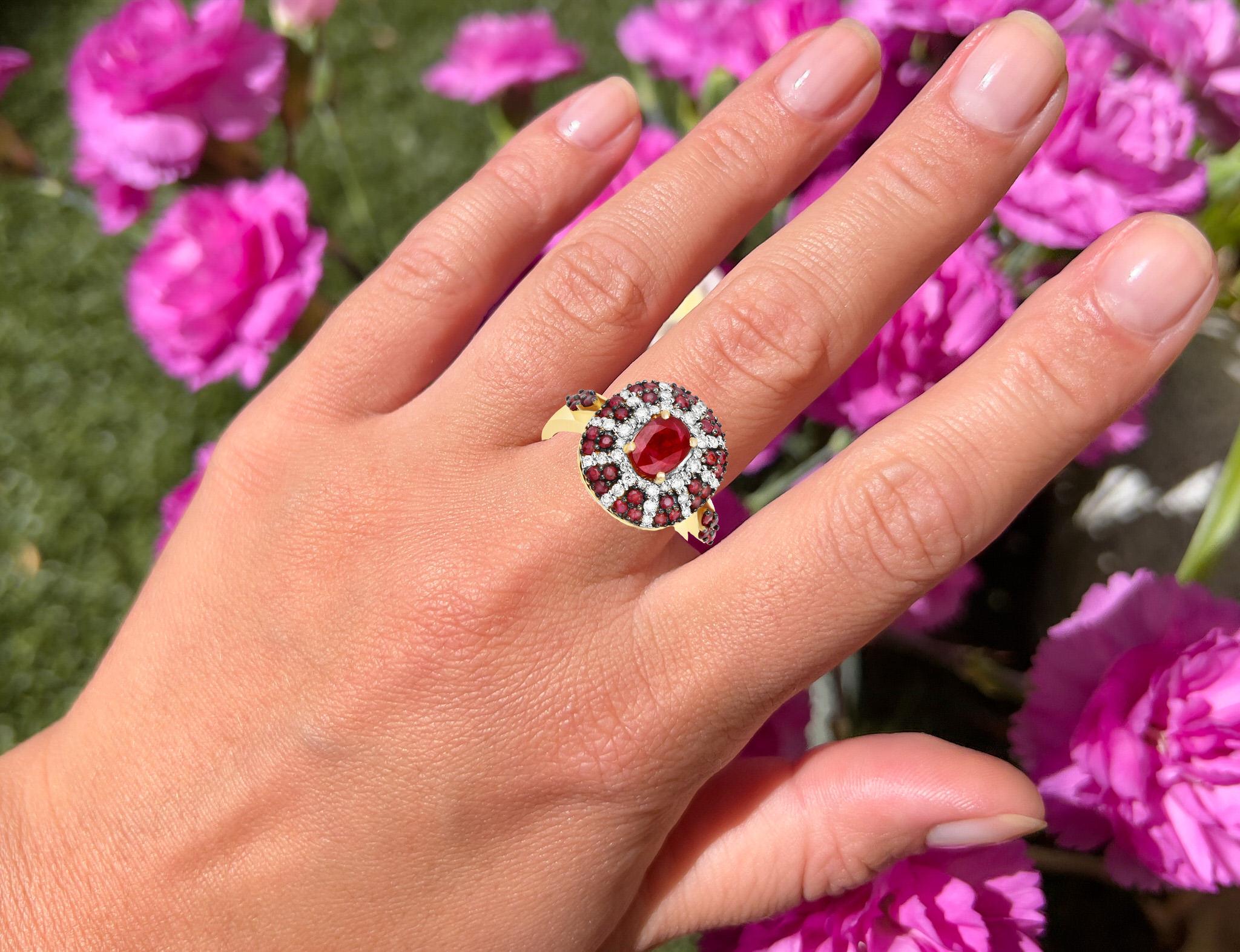 It comes with the appraisal by GIA GG/AJP
All Gemstones are Natural  
1 Oval Ruby = 0.85 Carat
38 Round Rubies = 0.72 Carats
40 Diamonds = 0.35 Carats
Metal: 14K Yellow Gold 
Ring Size: 7* US
*It can be resized complimentary