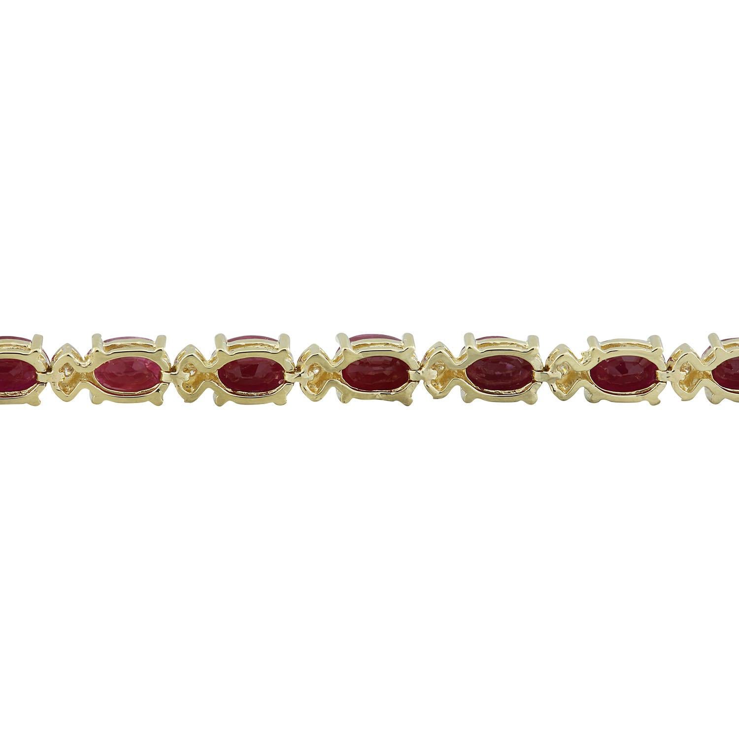 11.95 Carat Natural Ruby 14 Karat Solid Yellow Gold Diamond Bracelet
Stamped: 14K 
Total Bracelet Weight: 11.1 Grams
Bracelet Length: 7.0 Inches 
Ruby  Weight: 11.45 Carat (6.00x4.00 Millimeters) 
Diamond Weight: 0.50 Carat (F-G Color, VS2-SI1