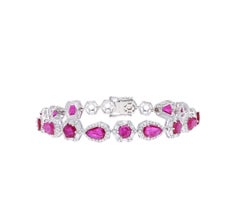 Bracciale con diamanti e rubini naturali in oro 18 carati