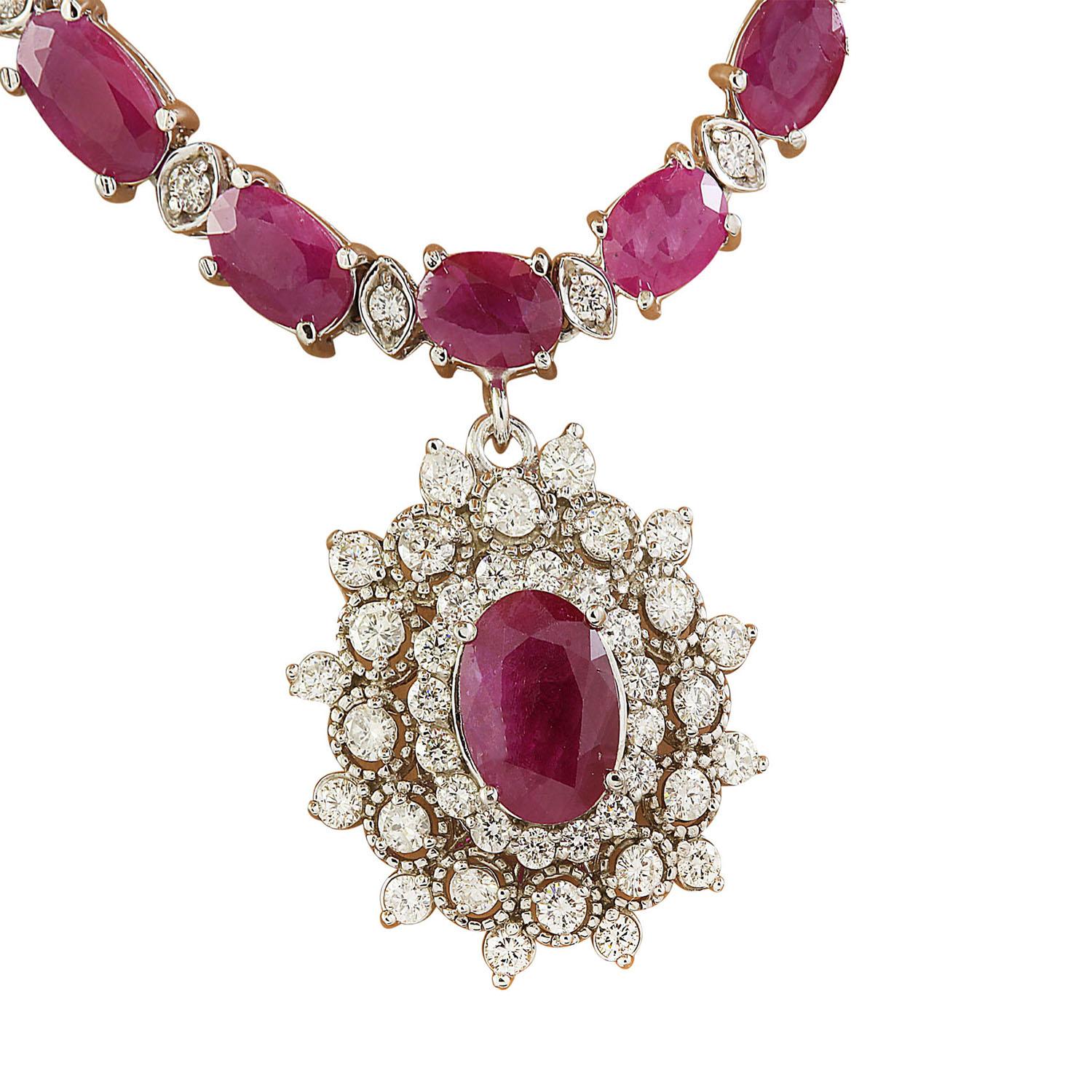 28.11 Carat Natural Ruby 14 Karat Solid White Gold Diamond Necklace
Stamped: 14K
Total Necklace Weight: 30 Grams
Necklace Length: 18 Inches
Center Ruby Weight: 2.31 Carat (9.00x7.00 Millimeters)
Side Ruby WeighT 23.00 Carat (6.00x4.00