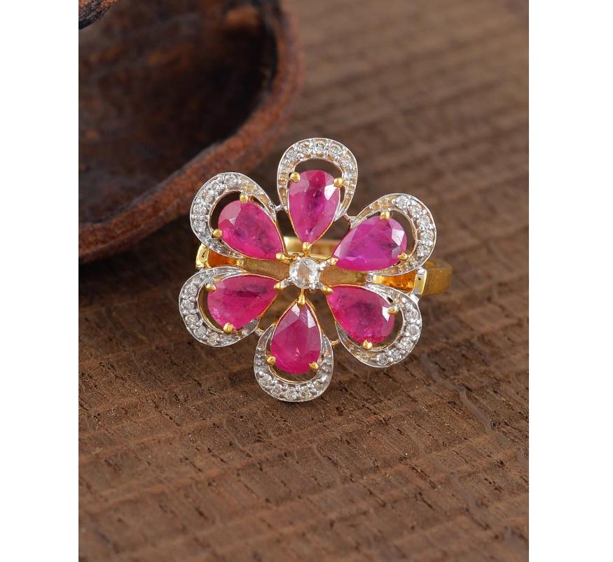 This ring is made with a beautiful ruby gemstone and accented with dazzling diamonds. It is made with 14K gold and is handmade for a one-of-a-kind look.

Specifications

Dimensions: Length: 2 cm
Gross Weight: 4.640 gms
Gold Weight: 4.146 gms
Gold