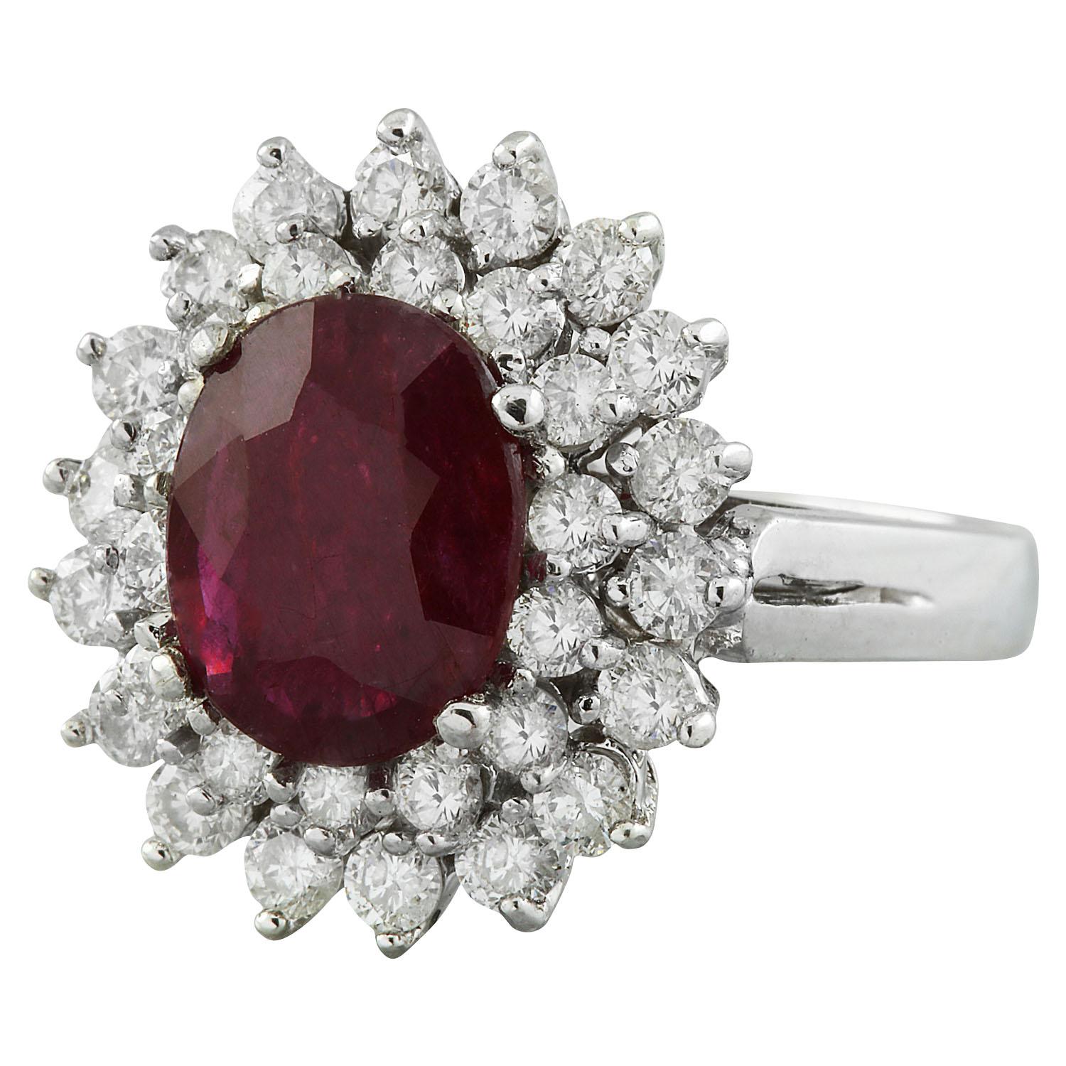 3.54 Carat Natural Ruby 14 Karat Solid White Gold Diamond Ring
Stamped: 14K
Total Ring Weight: 6.4 Grams 
Ruby Weight: 2.34 Carat (10.00x8.00 Millimeters) 
Diamond Weight: 1.20 carat (F-G Color, VS2-SI1 Clarity )
Quantity: 32
Face Measures:
