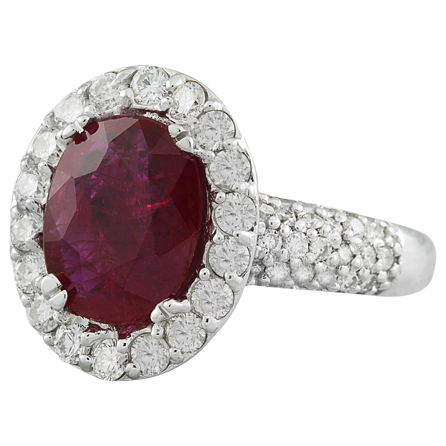 3.50 Carat Natural Ruby 14 Karat Solid White Gold Diamond Ring
Stamped: 14K
Total Ring Weight: 7 Grams 
Ruby Weight 2.60 Carat (10.00x8.00 Millimeters)
Diamond Weight: 0.90 carat (F-G Color, VS2-SI1 Clarity)
Quantity: 62
Face Measures: 15.70x13.40