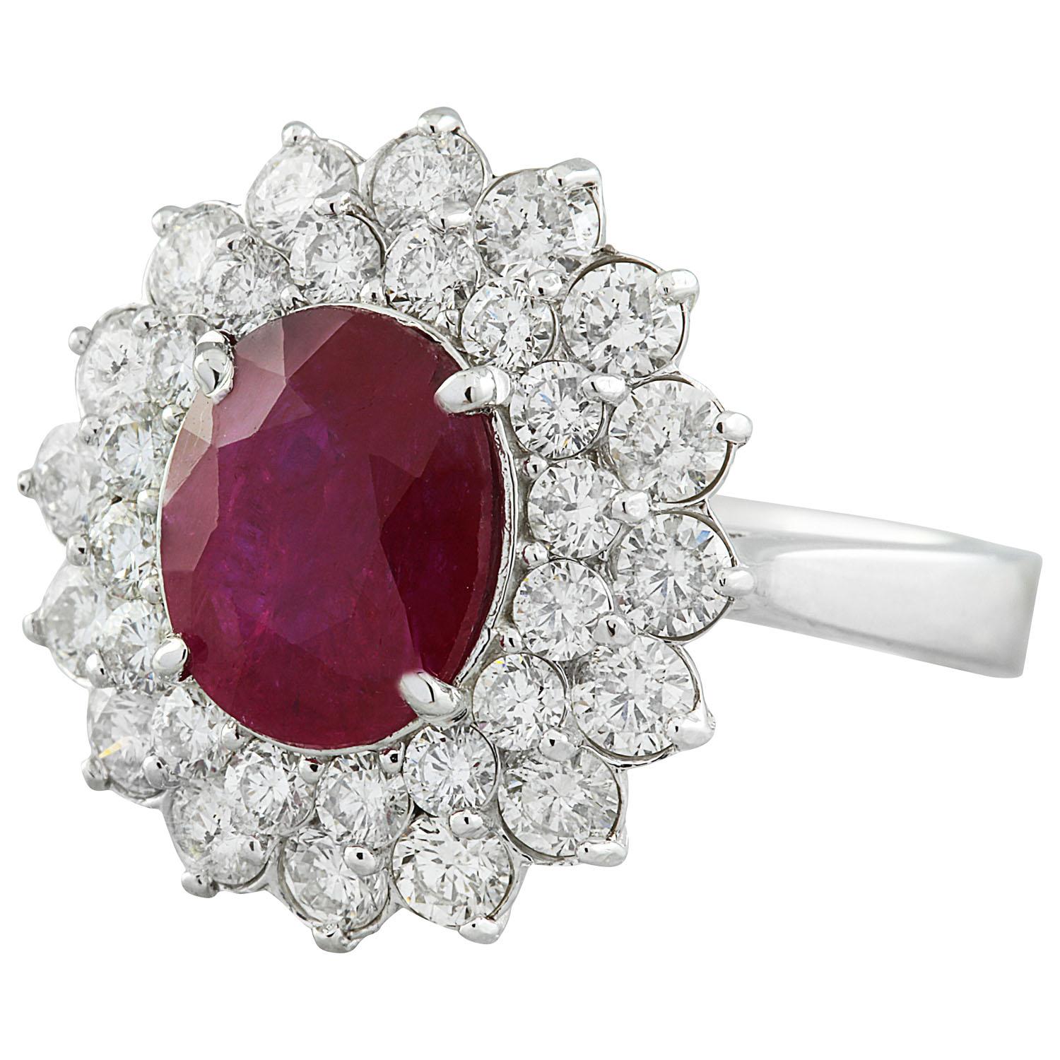 4.65 Carat Natural Ruby 14 Karat Solid White Gold Diamond Ring
Stamped: 14K 
Total Ring Weight: 6.4 Grams 
Ruby Weight 2.80 Carat (10.00x8.00 Millimeters)
Diamond Weight: 1.85 carat (F-G Color, VS2-SI1 Clarity )
Face Measures: 18.85x17.60 Millimeter