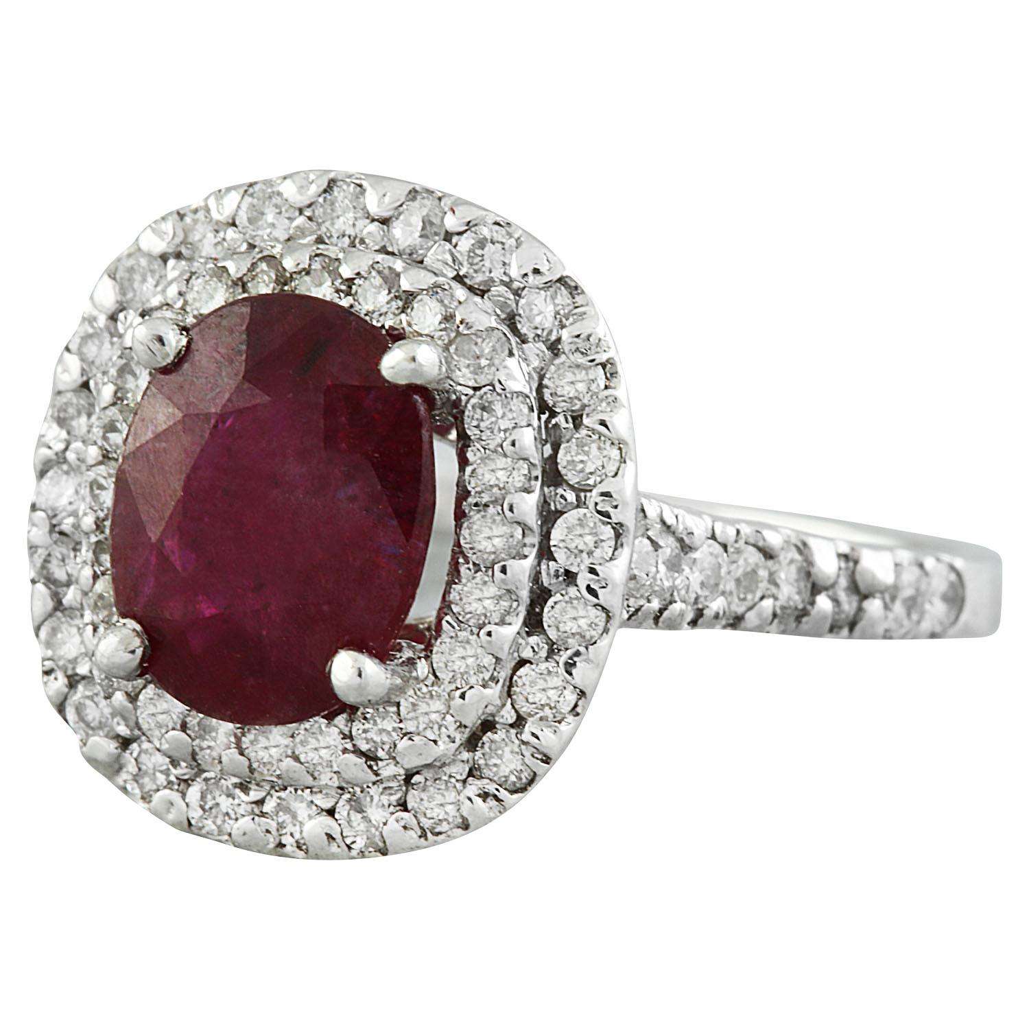 3.88 Carat Natural Ruby 14 Karat Solid White Gold Diamond Ring
Stamped: 14K 
Total Ring Weight: 4.6 Grams 
Ruby Weight 2.78 Carat (9.00x7.00 Millimeters)
Diamond Weight: 1.10 carat (F-G Color, VS2-SI1 Clarity )
Quantity: 64
Face Measures: