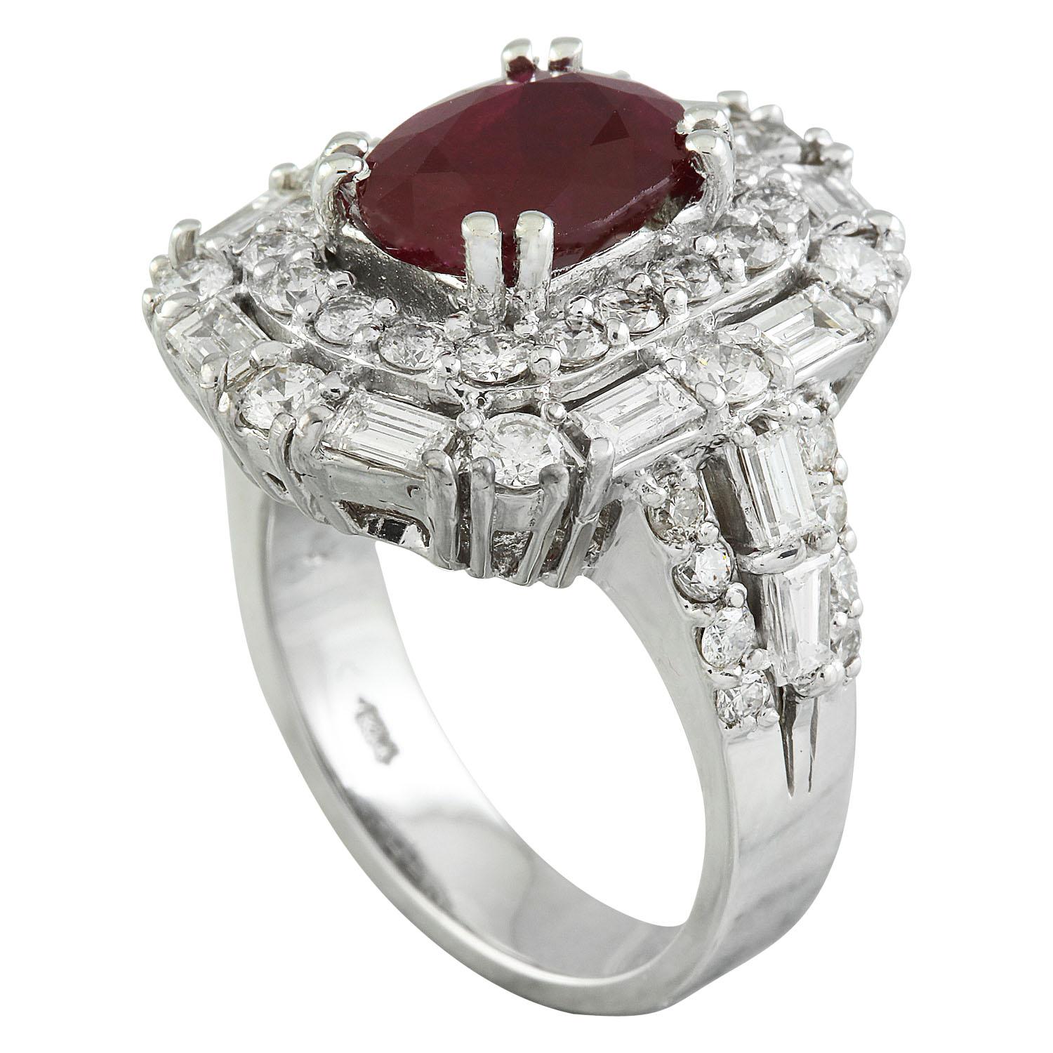 5.70 Carat Natural Ruby 14 Karat Solid White Gold Diamond Ring
Stamped: 14K 
Total Ring Weight: 11.7 Grams 
Ruby Weight 3.20 Carat (10.00x8.00 Millimeters)
Diamond Weight: 2.50 carat (F-G Color, VS2-SI1 Clarity )
Face Measures: 21.40x17.80