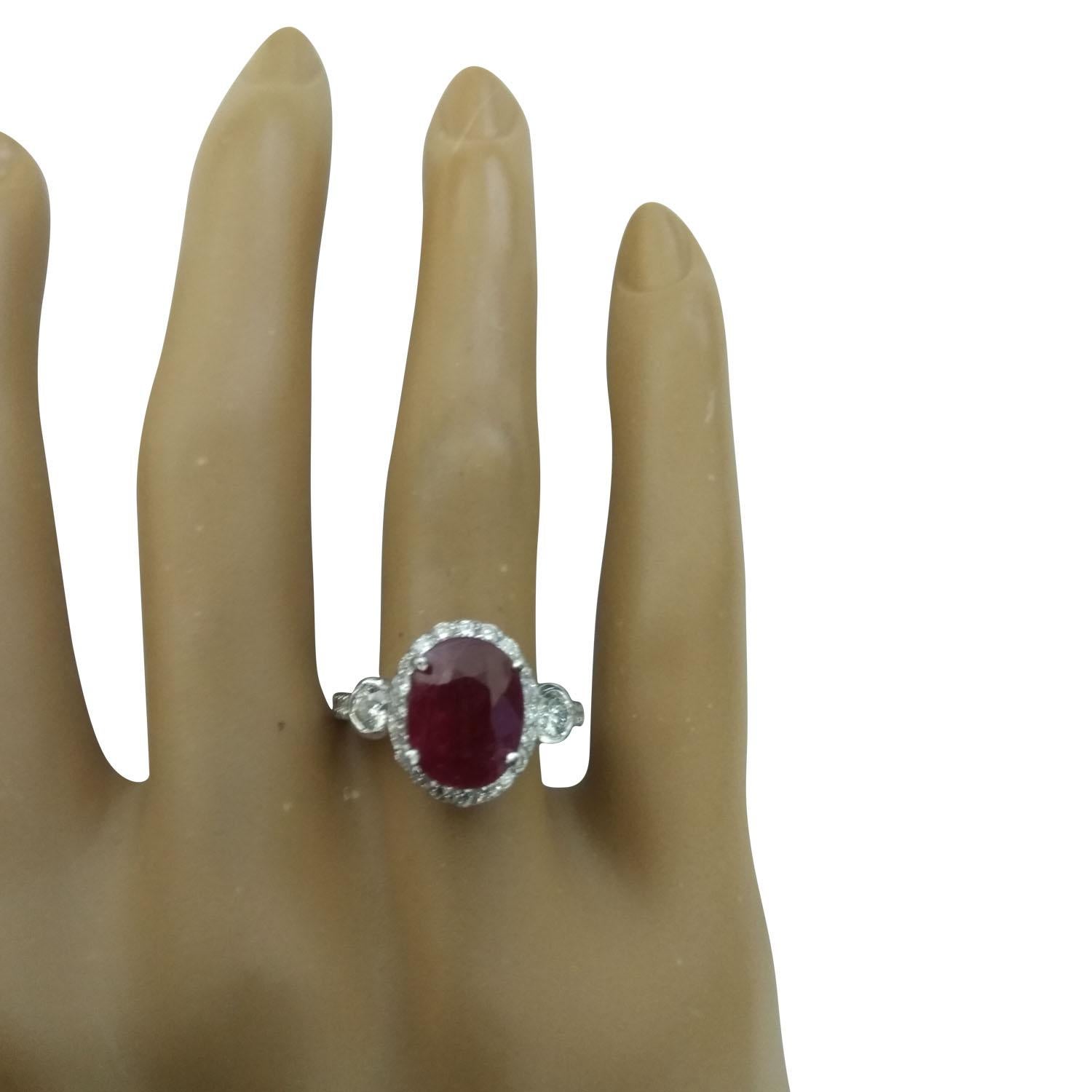 3.00 Carat Natural Ruby 14 Karat Solid White Gold Diamond Ring
Stamped: 14K 
Total Ring Weight: 3.6 Grams 
Ruby Weight 2.25 Carat (10.00x8.00 Millimeters)
Diamond Weight: 0.75 carat (F-G Color, VS2-SI1 Clarity)
Face Measures: 12.85x10.70 Millimeter