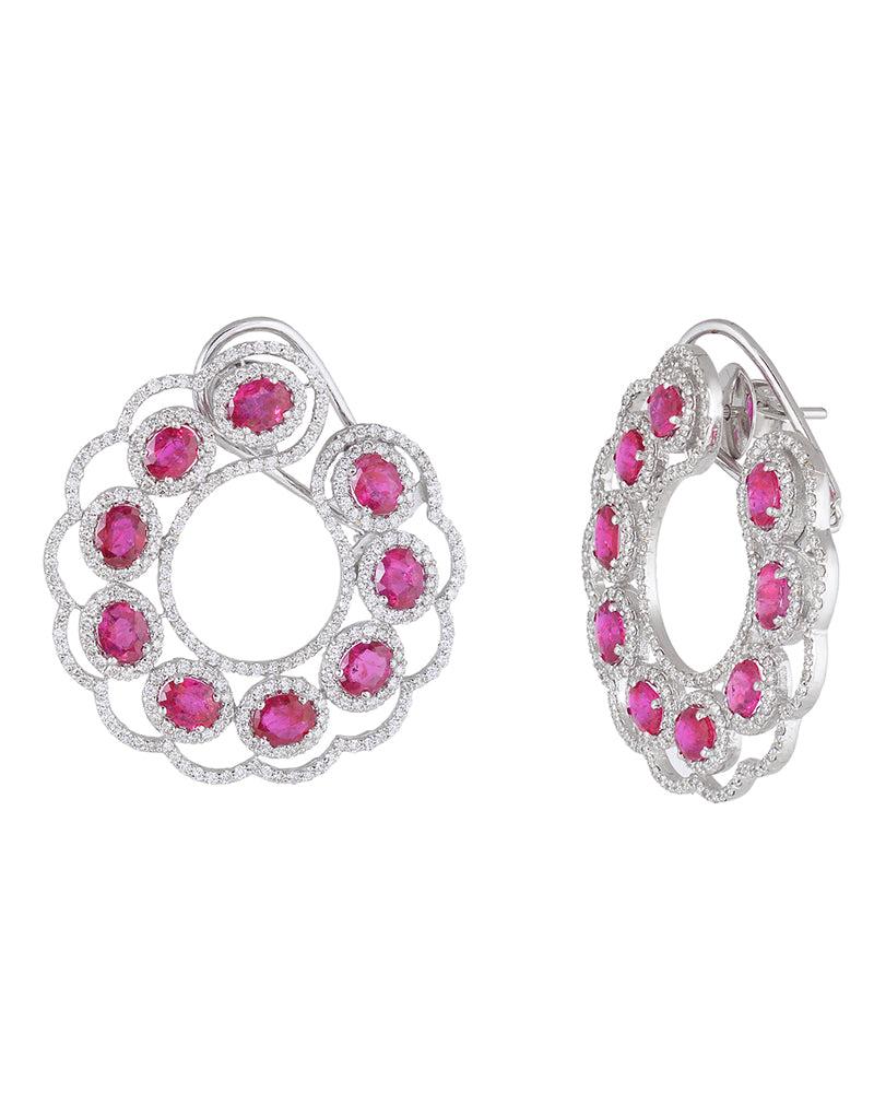 These earrings are made with 18k white gold and round diamonds. The earrings are designed with a hoop style. The diamonds are set in a prong setting. The earrings have a total diamond weight of 1/2 ct.

Specifications

Dimensions: Length: 3.6 cm,