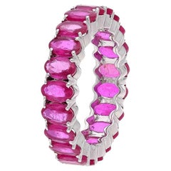 Natural ruby eternity band ring in 18k gold