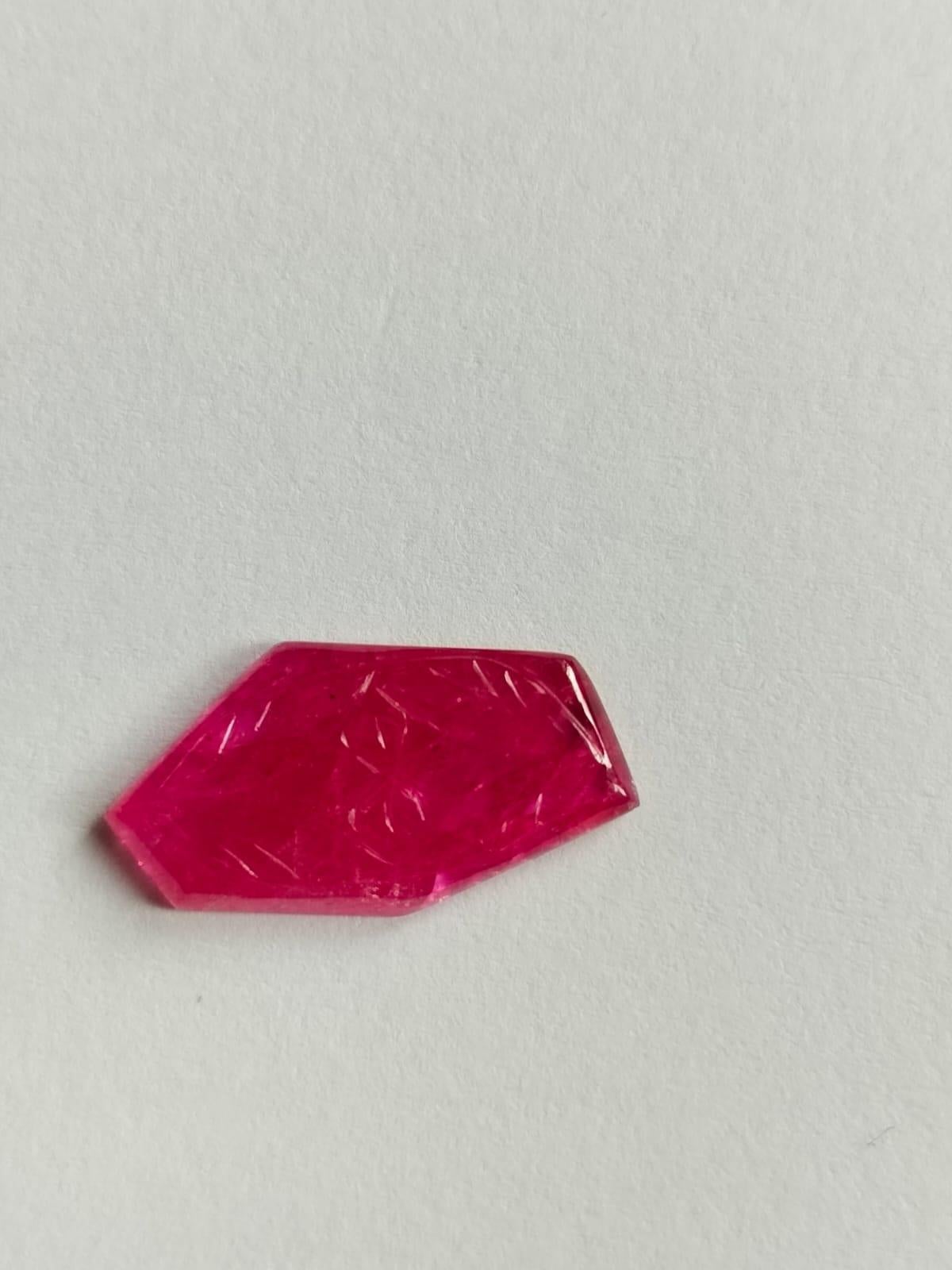 Natural Red Ruby Handmade Carving Fancy Gemstone.
8.22 Carat with a elegant Red color and excellent clarity. Also has an excellent fancy carving with ideal polish to show great shine and color . It will look authentic in jewelry. The dimensions of