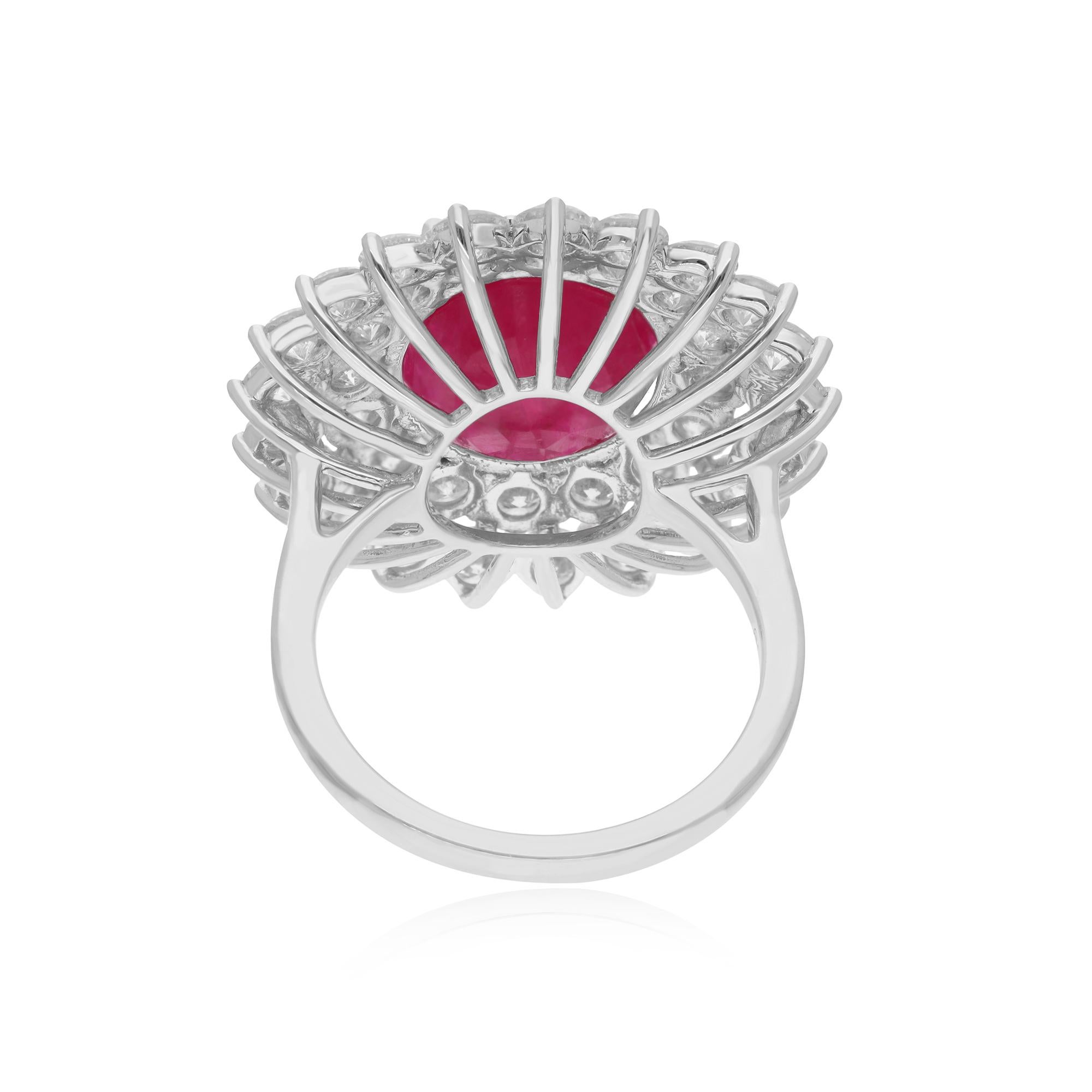 Indulge in the timeless allure of this Natural Ruby Gemstone Cocktail Ring, adorned with shimmering diamonds and meticulously handcrafted in luxurious 18 karat white gold. This exquisite piece of handmade jewelry is a true symbol of elegance and