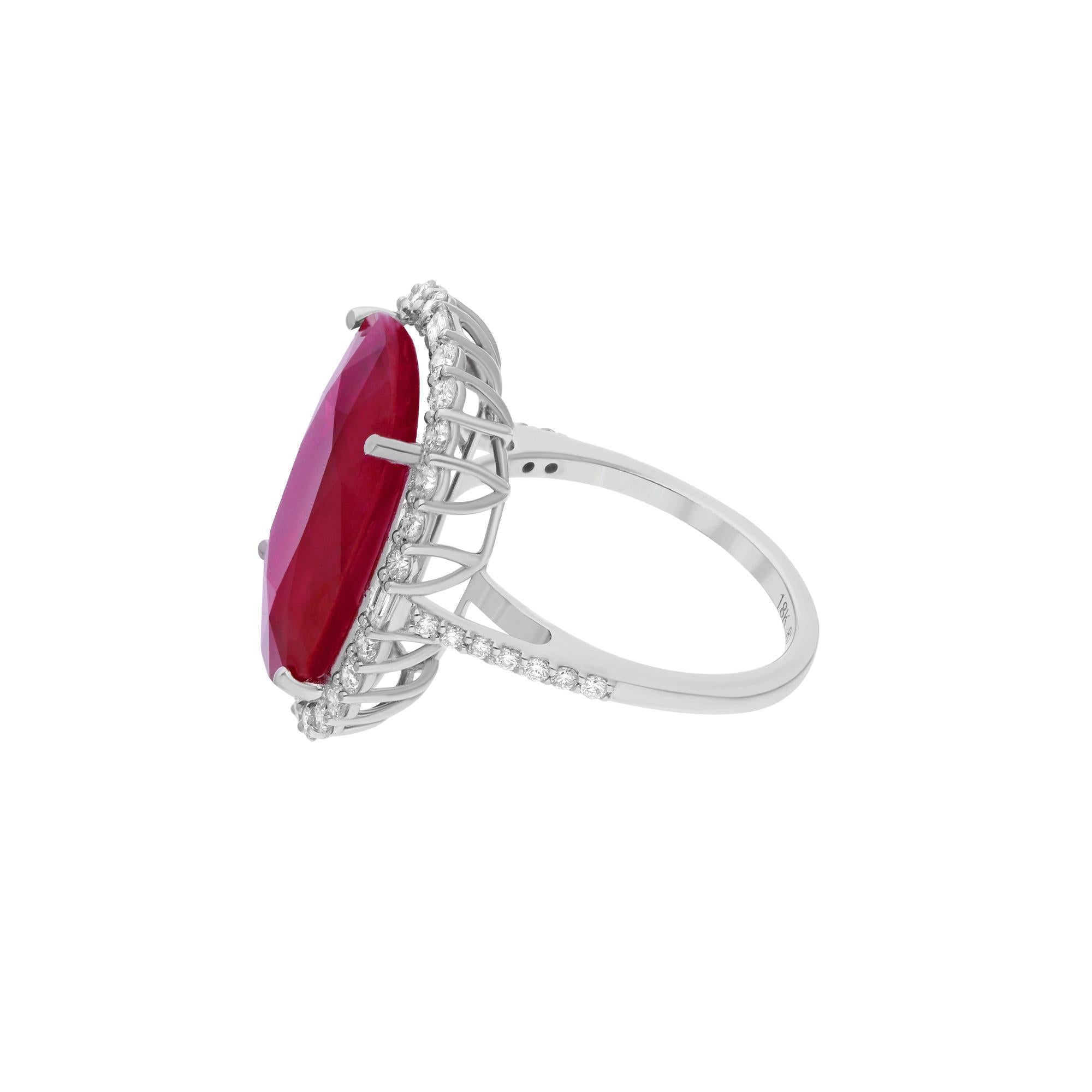 Cast from 18-karat gold, these exquisite ring is handset with 14.24 carats ruby gemstone and 0.90 carats of sparkling diamonds.

The ring is a size 7 and may be resized to larger or smaller upon request. FOLLOW SPECTRUM JEWELS storefront to view the