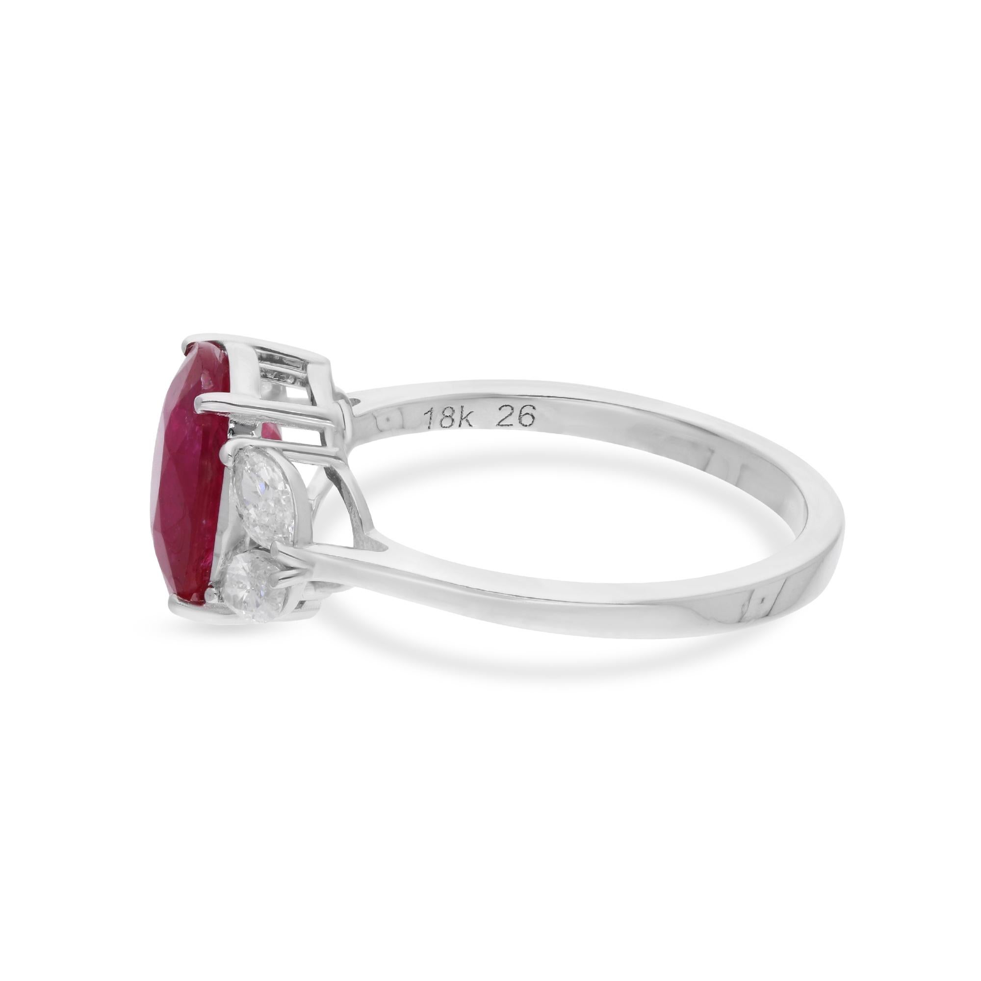 Step into a world of timeless elegance with this Natural Ruby Gemstone Cocktail Ring, adorned with exquisite marquise diamonds and meticulously crafted in 14 karat white gold. This stunning piece of fine jewelry is a celebration of sophistication